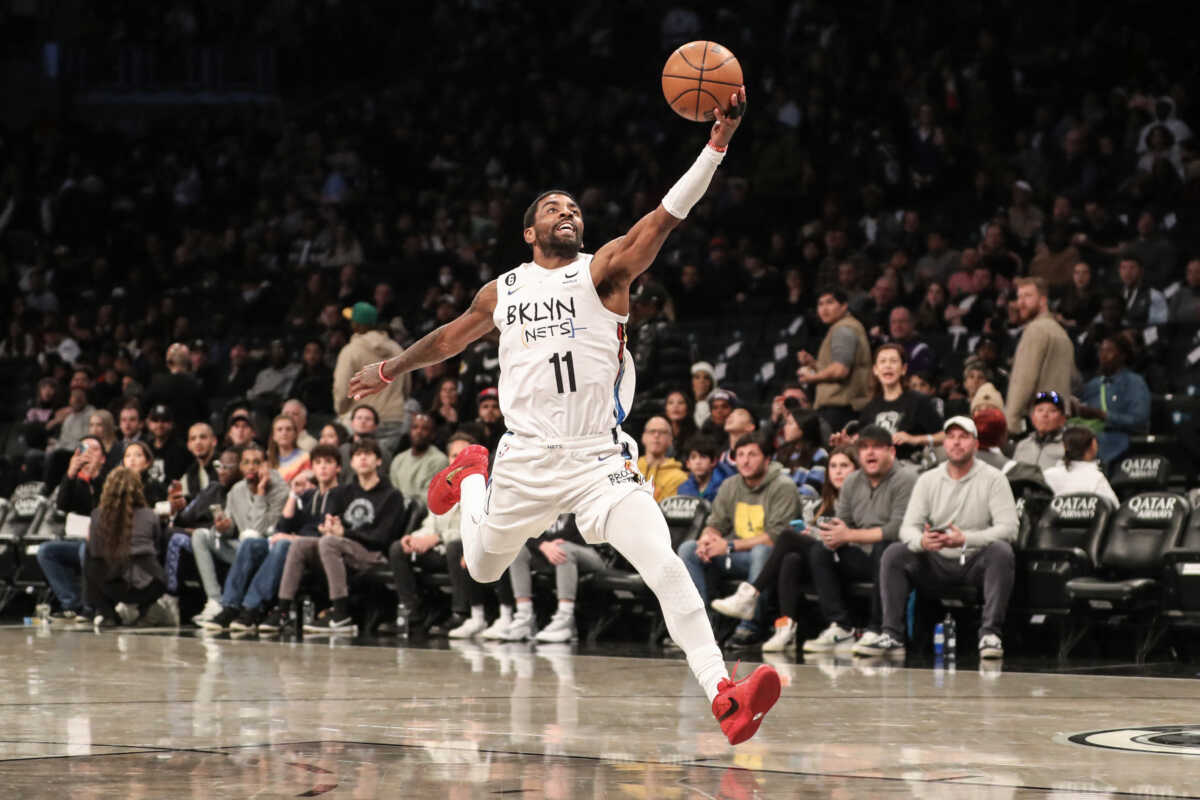 Nov 20, 2022; Brooklyn, New York, USA;  Brooklyn Nets guard Kyrie Irving (11) catches an outlet pass in the third quarter against the Memphis Grizzlies at Barclays Center. Mandatory Credit: Wendell Cruz-USA TODAY Sports