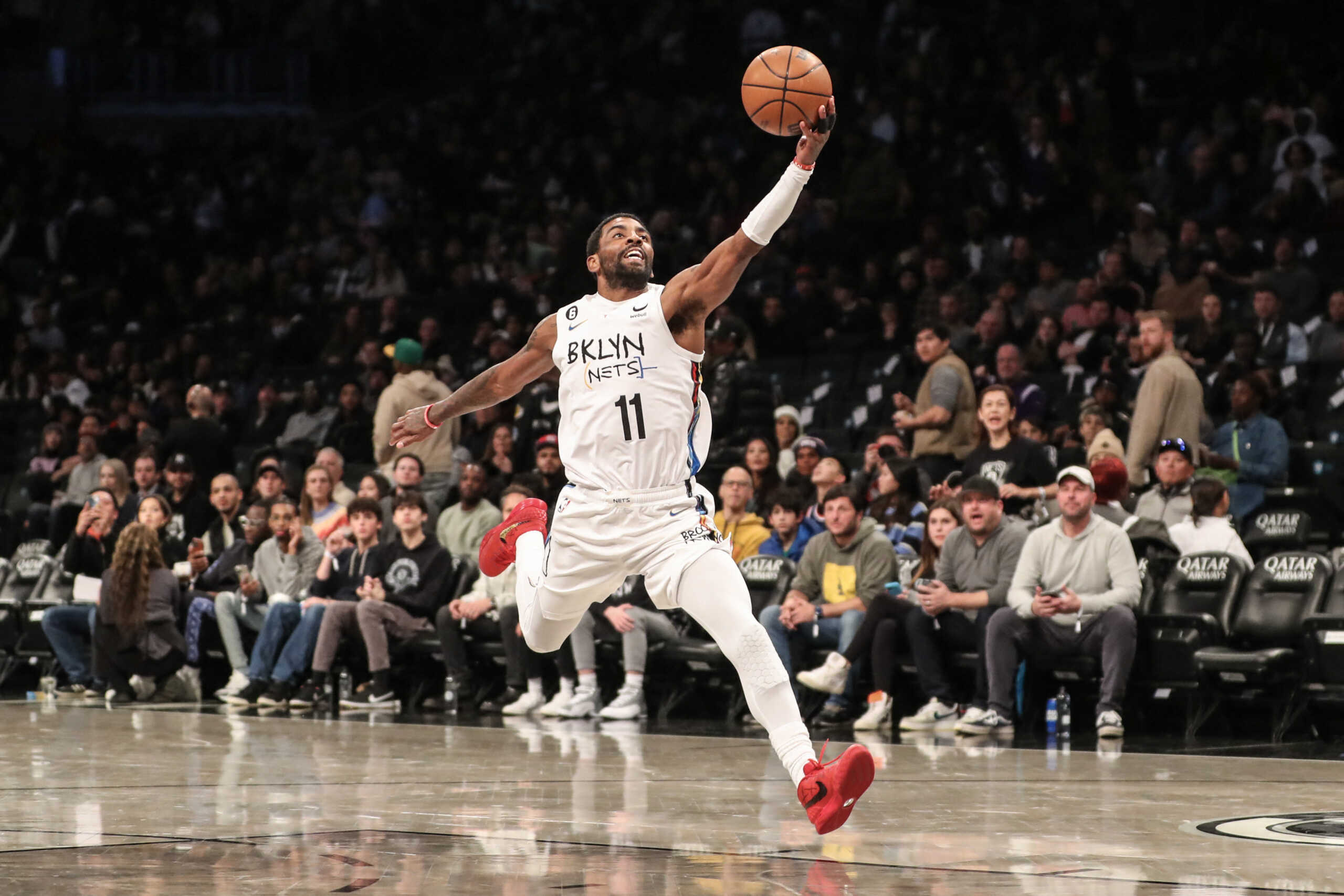 Nov 20, 2022; Brooklyn, New York, USA;  Brooklyn Nets guard Kyrie Irving (11) catches an outlet pass in the third quarter against the Memphis Grizzlies at Barclays Center. Mandatory Credit: Wendell Cruz-USA TODAY Sports