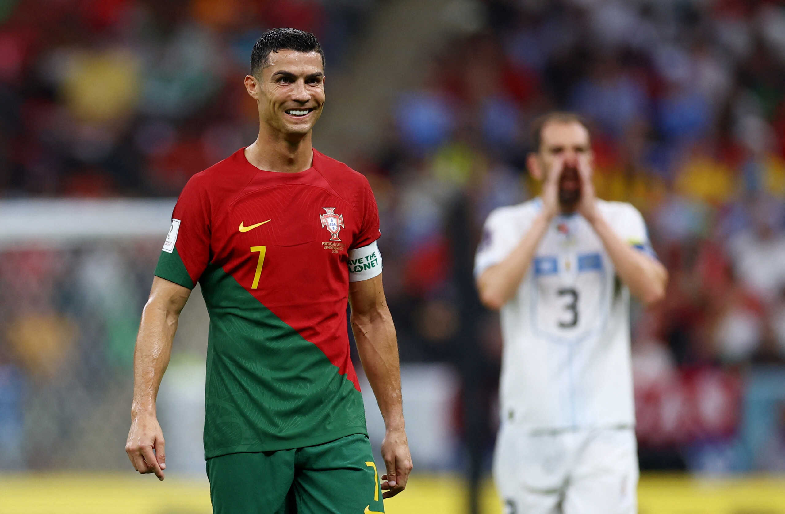 Soccer Football - FIFA World Cup Qatar 2022 - Group H - Portugal v Uruguay - Lusail Stadium, Lusail, Qatar - November 28, 2022  Portugal's Cristiano Ronaldo celebrates scoring their first goal with Joao Felix REUTERS