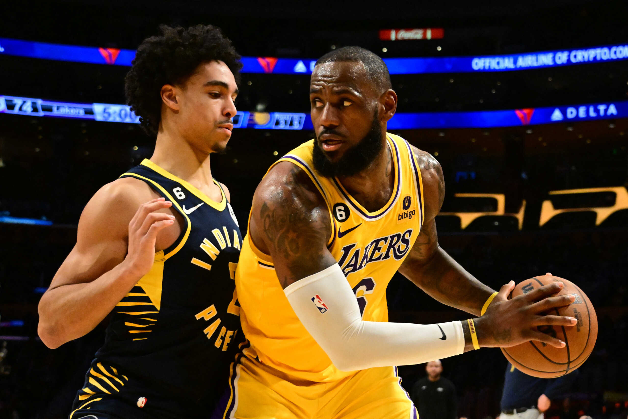 Nov 28, 2022; Los Angeles, California, USA; Los Angeles Lakers forward LeBron James (6) controls the ball against Indiana Pacers guard Andrew Nembhard (2) in the second half at Crypto.com Arena. Mandatory Credit: Richard Mackson-USA TODAY Sports