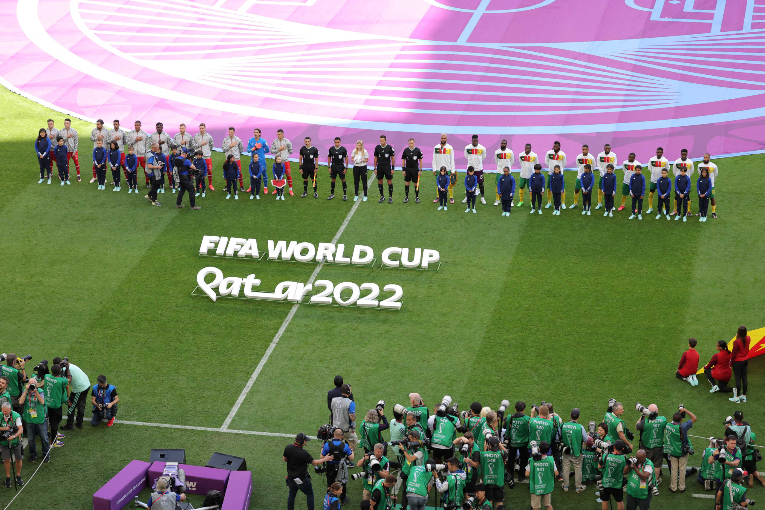 Soccer Football - FIFA World Cup Qatar 2022 - Group G - Switzerland v Cameroon - Al Janoub Stadium, Al Wakrah, Qatar - November 24, 2022 General view as teams and match officials line up before the match REUTERS