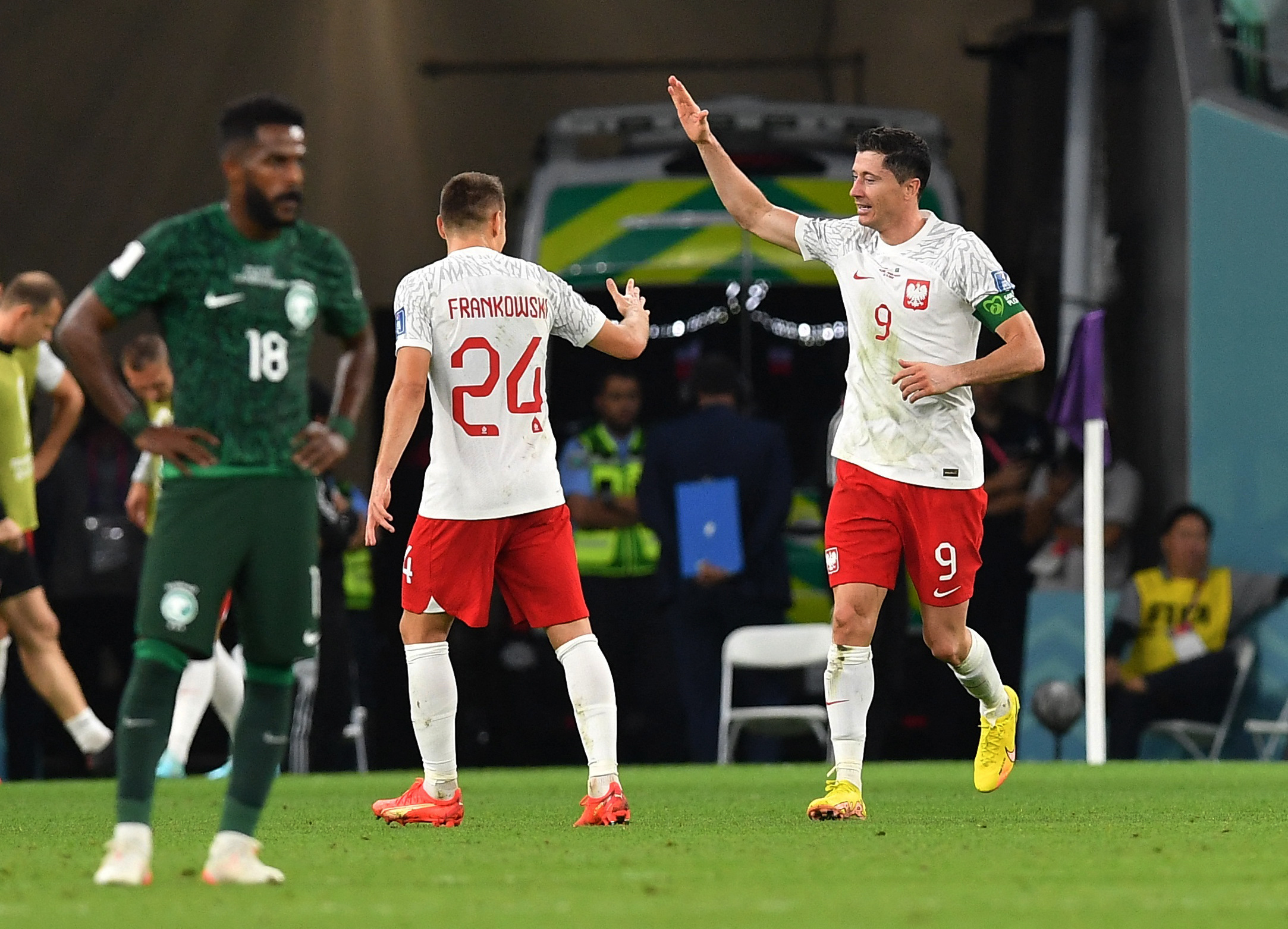 Soccer Football - FIFA World Cup Qatar 2022 - Group C - Poland v Saudi Arabia - Education City Stadium, Al Rayyan, Qatar - November 26, 2022 Poland's Robert Lewandowski celebrates scoring their second goal with Przemyslaw Frankowski REUTERS