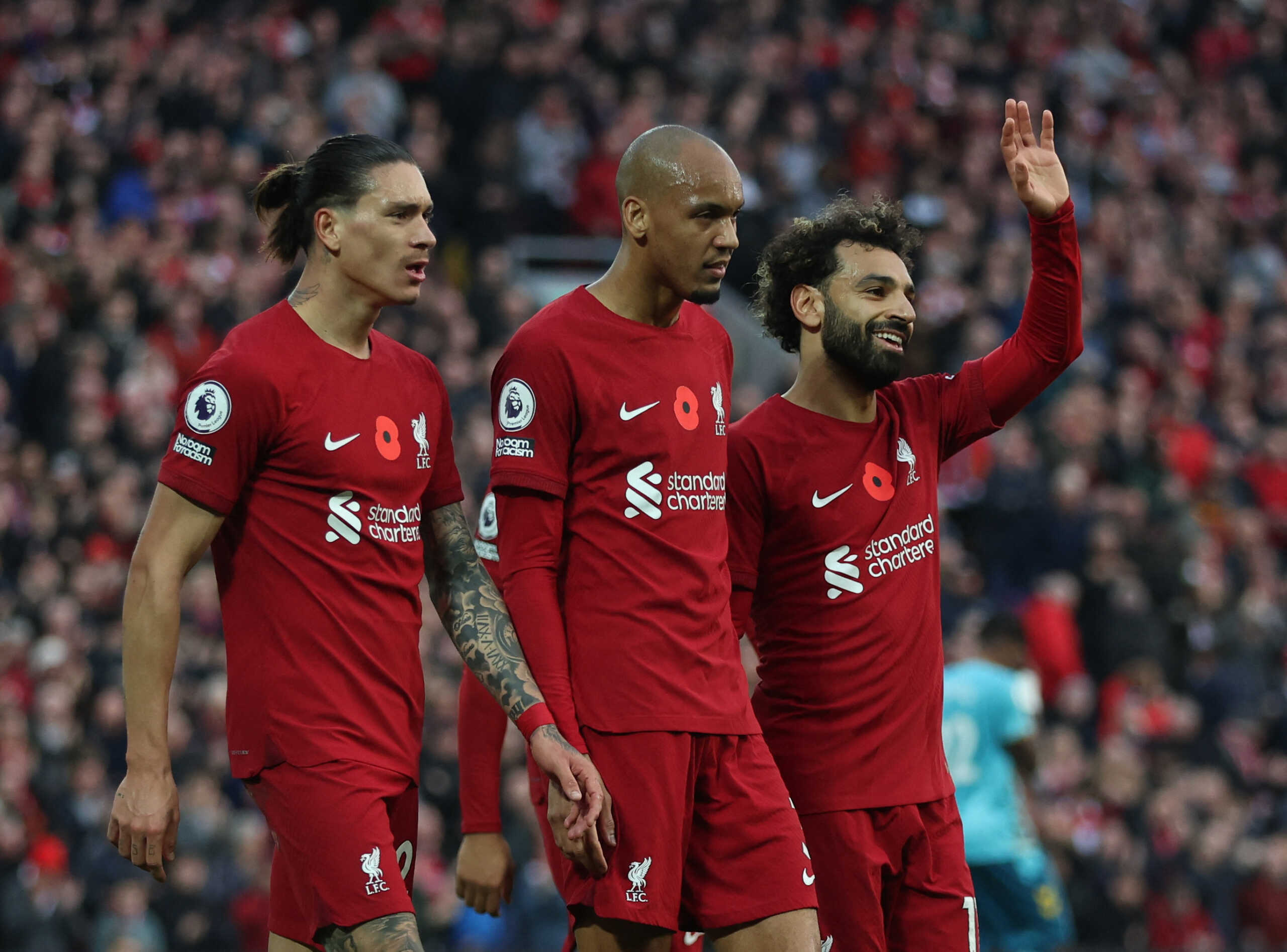 Soccer Football - Premier League - Liverpool v Southampton - Anfield, Liverpool, Britain - November 12, 2022 Liverpool's Darwin Nunez celebrates scoring their third goal with Fabinho and Mohamed Salah REUTERS