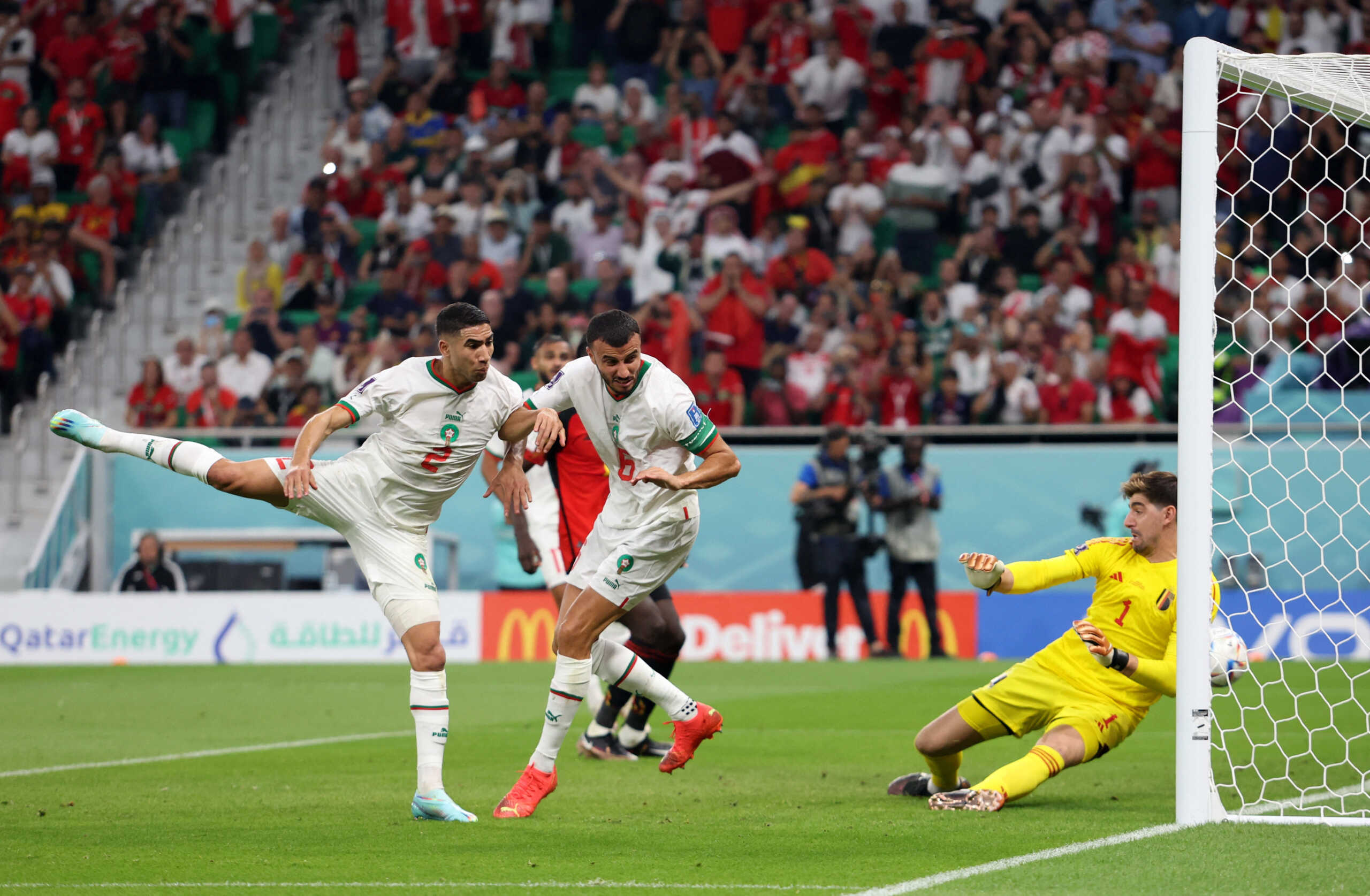 Soccer Football - FIFA World Cup Qatar 2022 - Group F - Belgium v Morocco - Al Thumama Stadium, Doha, Qatar - November 27, 2022 Morocco's Achraf Hakimi and Romain Saiss in action as teammate Hakim Ziyech scores a goal before it is disallowed following a VAR review REUTERS