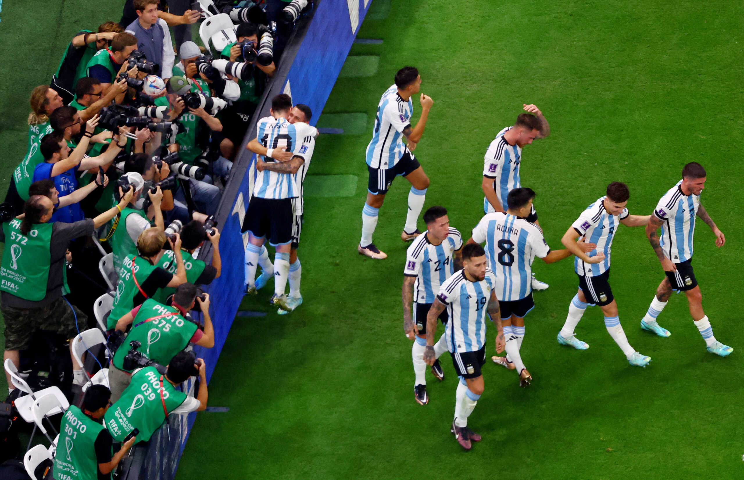 Soccer Football - FIFA World Cup Qatar 2022 - Group C - Argentina v Mexico - Lusail Stadium, Lusail, Qatar - November 26, 2022 Argentina's Lionel Messi celebrates scoring their first goal with teammates REUTERS