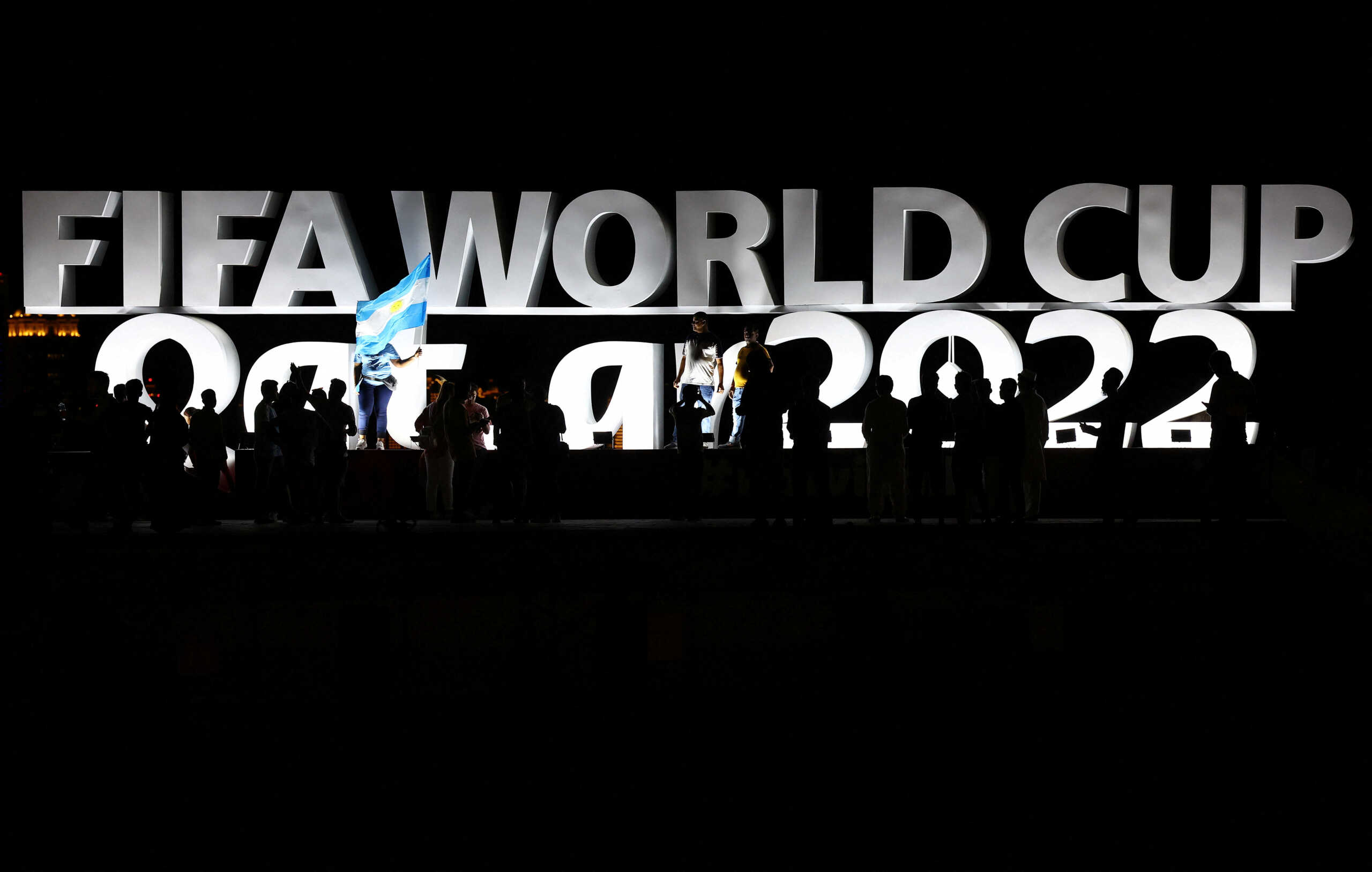 Soccer Football - FIFA World Cup Qatar 2022 - A football fan with an Argentine flag is photographed in Doha, Qatar - November 15, 2022. REUTERS