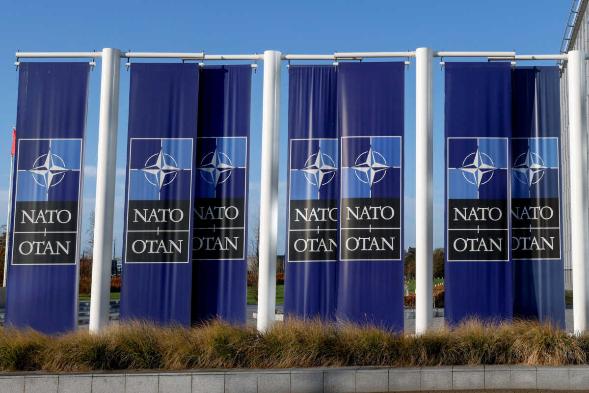 A view shows banners outside NATO headquarters in Brussels, Belgium, November 16, 2022. REUTERS