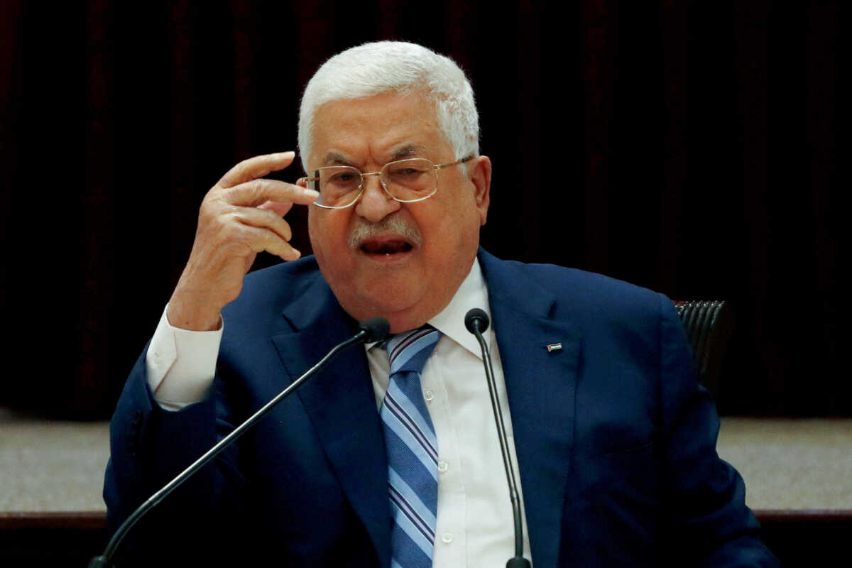 FILE PHOTO: President Mahmoud Abbas gestures during a meeting in Ramallah, in the Israeli-occupied West Bank August 18, 2020. REUTERS