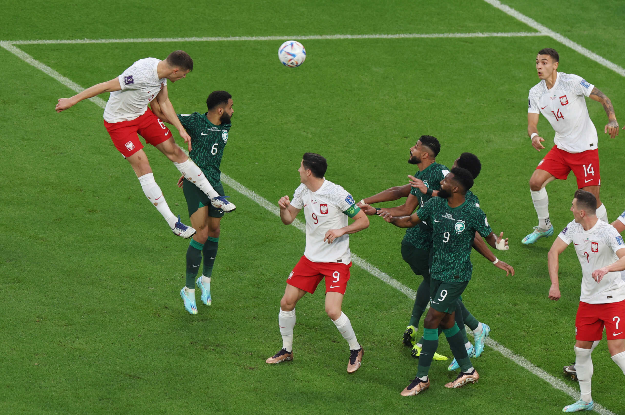 Soccer Football - FIFA World Cup Qatar 2022 - Group C - Poland v Saudi Arabia - Education City Stadium, Al Rayyan, Qatar - November 26, 2022 Poland's Krystian Bielik heads at goal REUTERS
