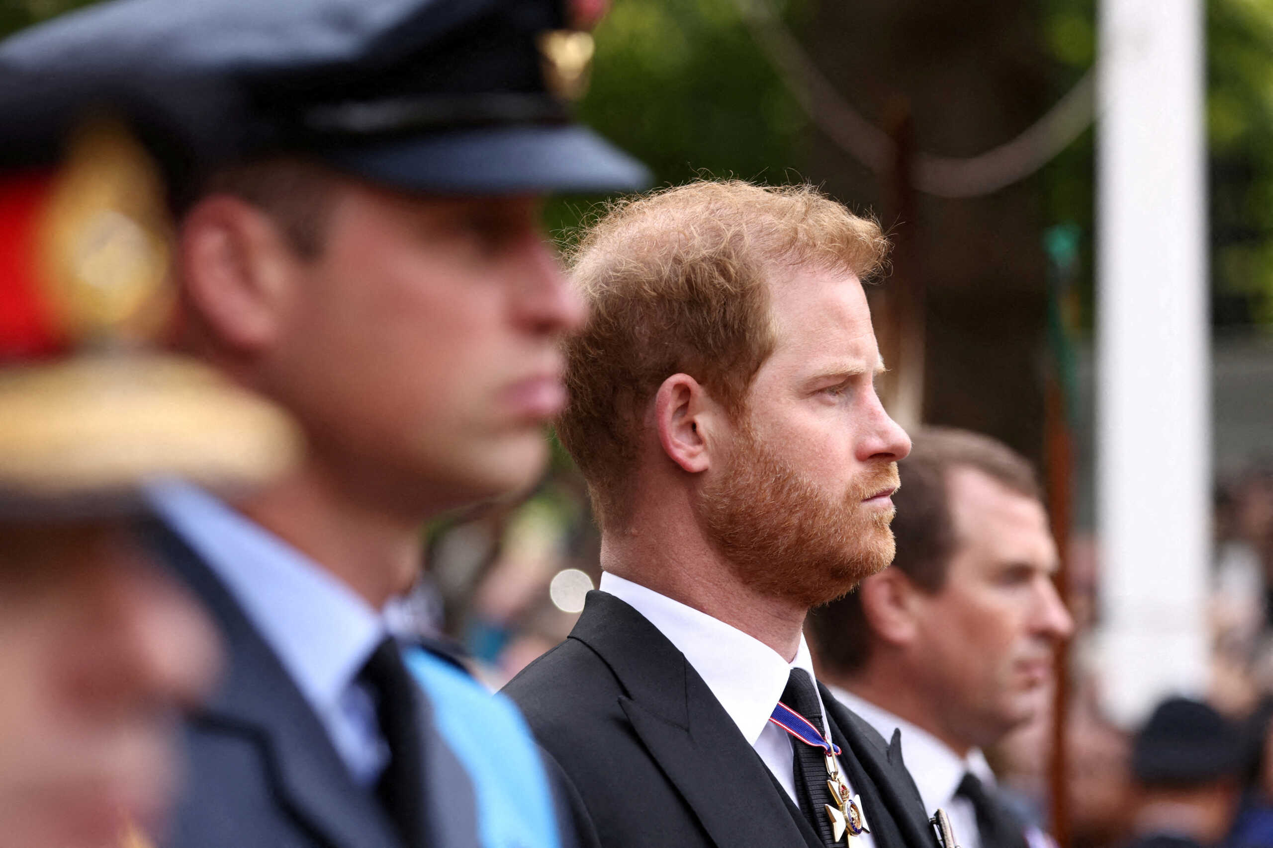 FILE PHOTO: Britain's William, Prince of Wales and Britain's Prince Harry, Duke of Sussex attend the state funeral and burial of Britain's Queen Elizabeth, in London, Britain, September 19, 2022. REUTERS