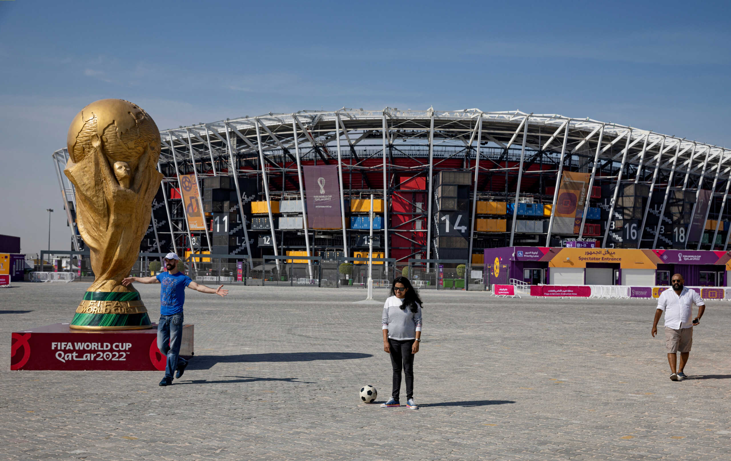 Soccer Football - FIFA World Cup Qatar 2022 - 974 Stadium, Doha, Qatar - November 17, 2022 General view of a giant replica World Cup as fans are seen outside the stadium ahead of the FIFA World Cup Qatar 2022 REUTERS