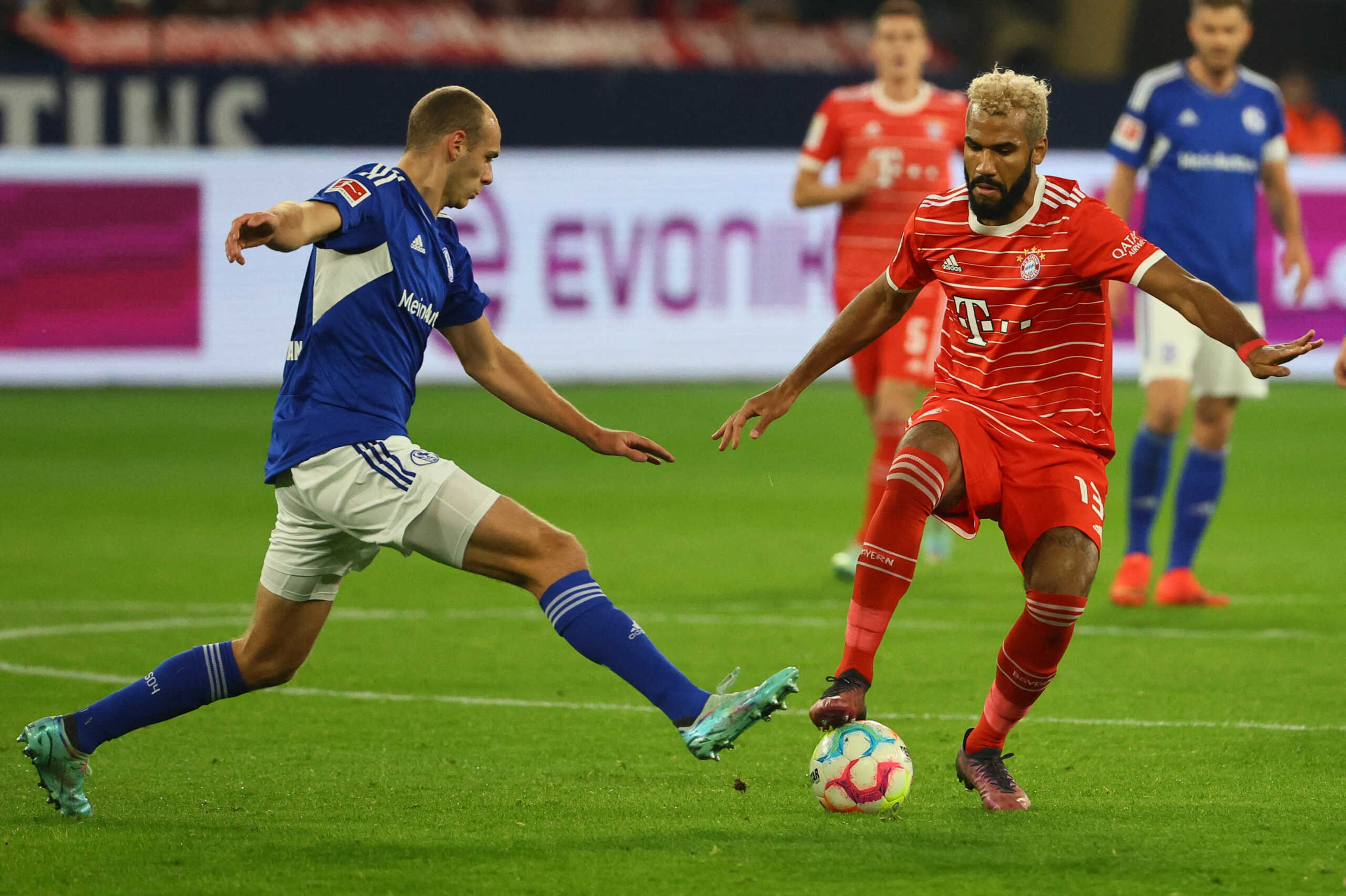 Soccer Football - Bundesliga - Schalke 04 v Bayern Munich - Veltins-Arena, Gelsenkirchen, Germany - November 12, 2022 Schalke 04's Henning Matriciani in action with Bayern Munich's Eric Maxim Choupo-Moting REUTERS