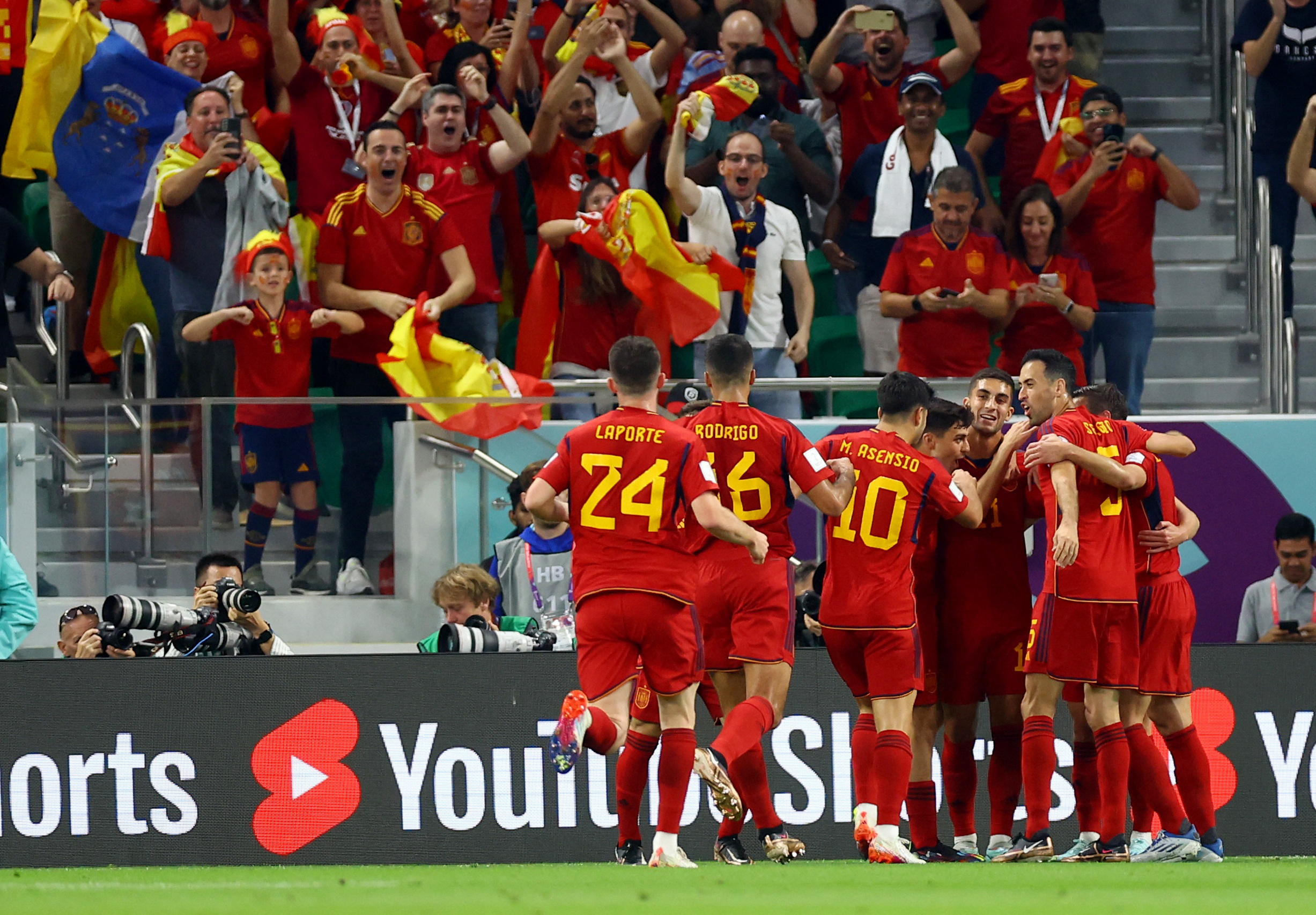 Soccer Football - FIFA World Cup Qatar 2022 - Group E - Spain v Costa Rica - Al Thumama Stadium, Doha, Qatar - November 23, 2022 Spain's Dani Olmo celebrates scoring their first goal with teammates REUTERS