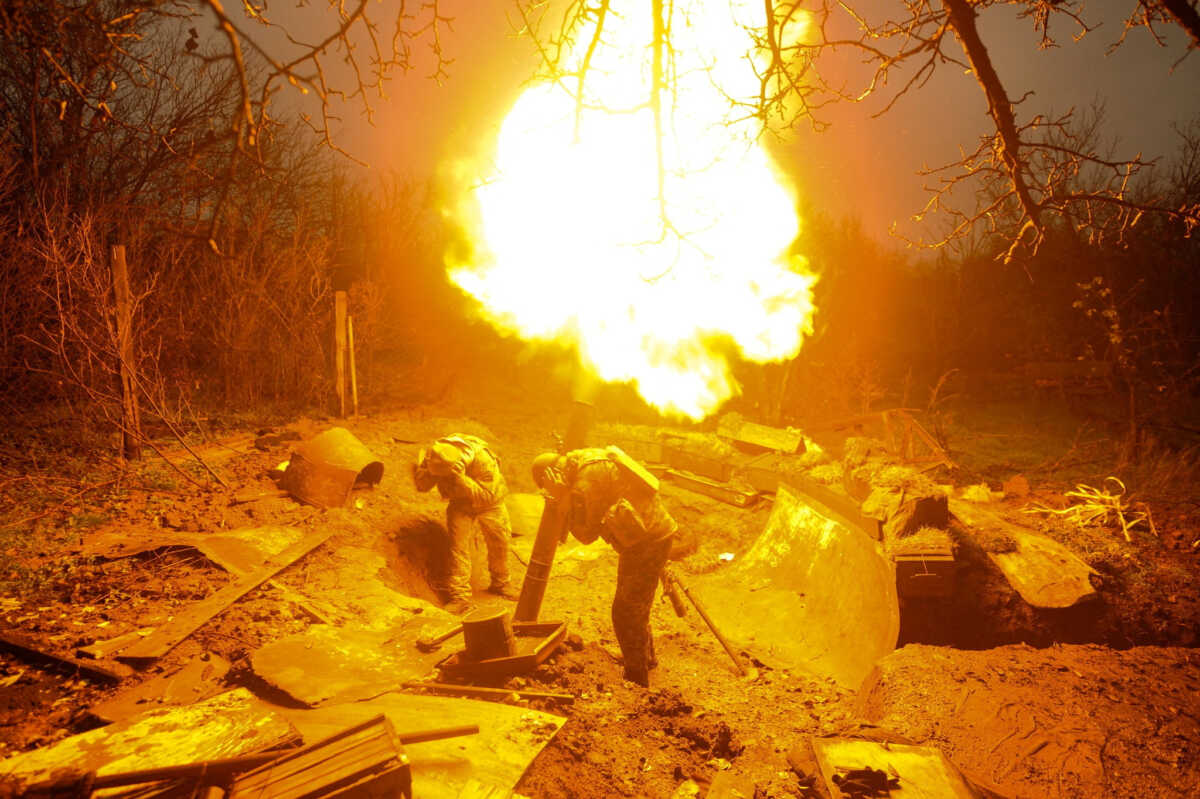 Ukrainian servicemen fire a mortar on a front line, as Russia's attack on Ukraine continues, in Donetsk region, Ukraine, in this handout image released November 20, 2022.  Iryna Rybakova