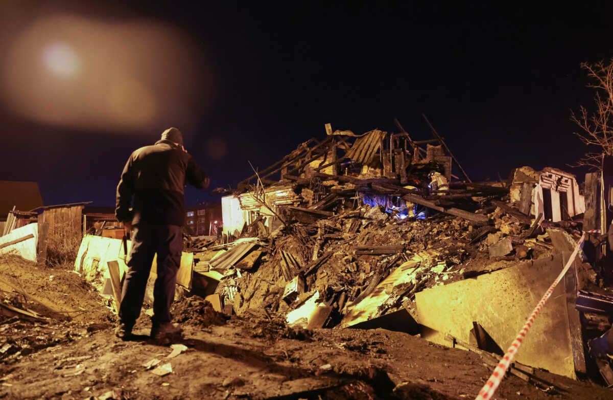 A view shows the site where a military plane crashed into a residential building in the city of Irkutsk, Russia October 23, 2022.  REUTERS