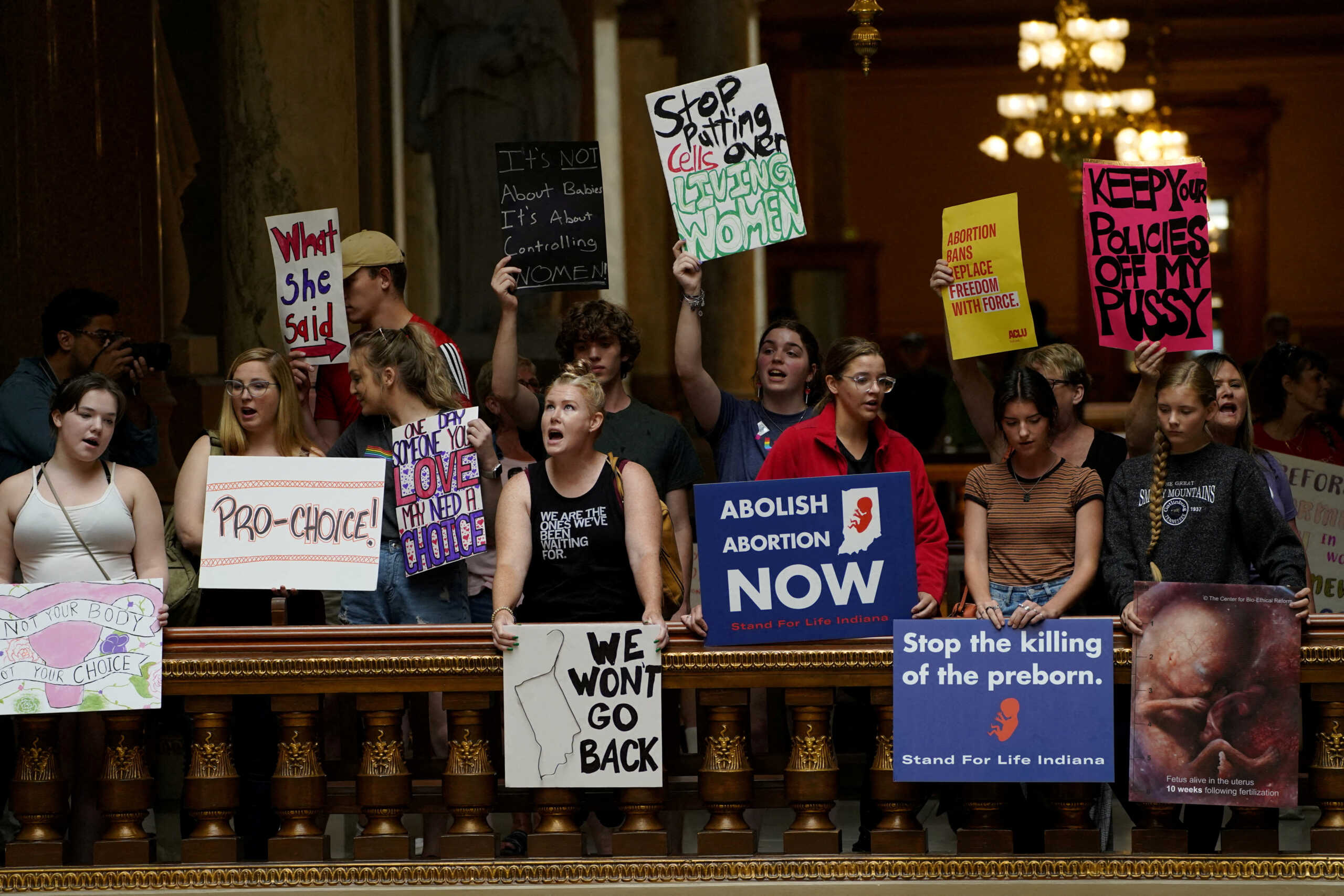 FILE PHOTO: Activists protest in the Indiana Statehouse during a special session debating on banning abortion in Indianapolis, Indiana, U.S. July 25, 2022.  REUTERS