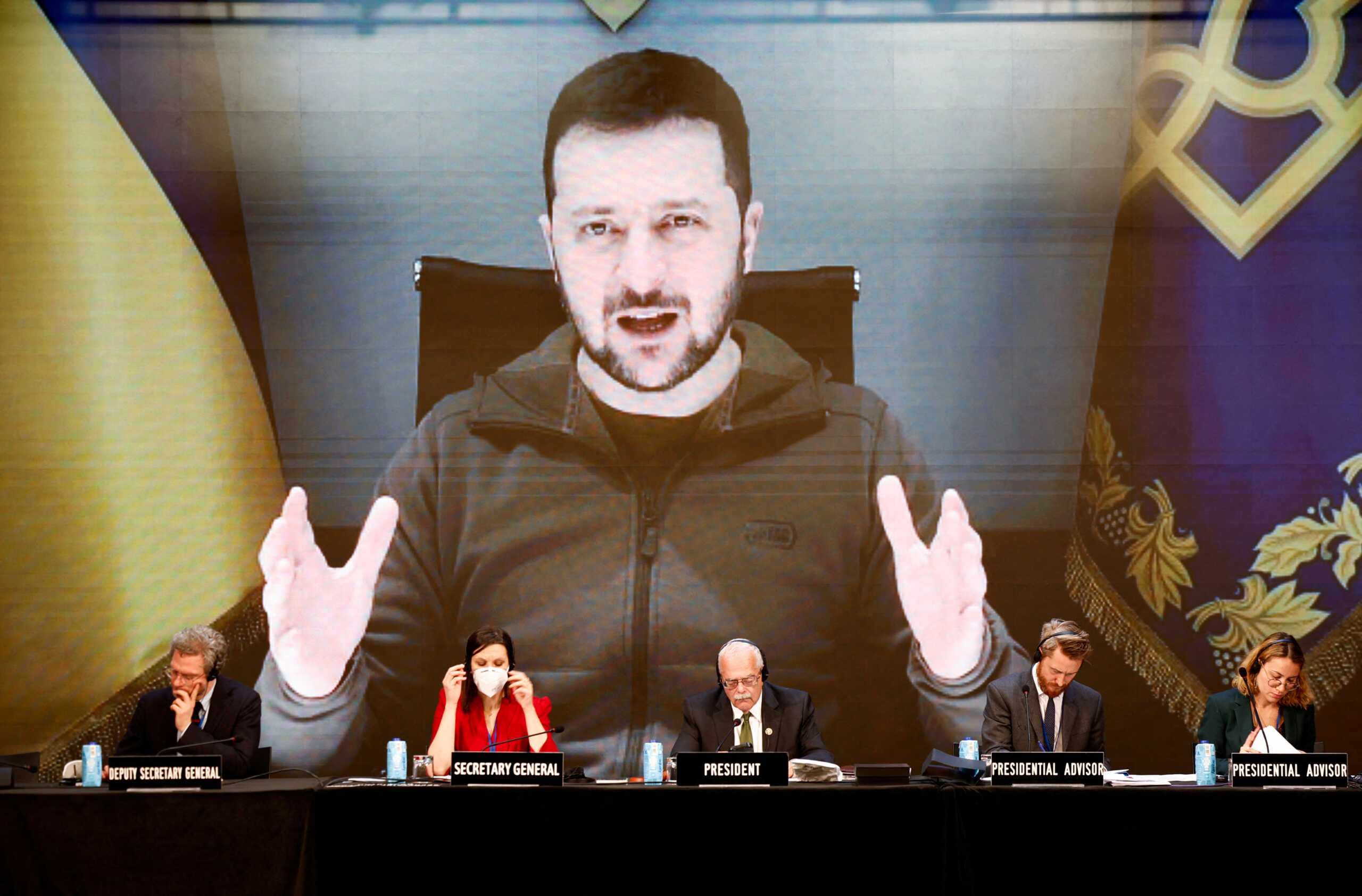 FILE PHOTO: Ukraine's President Volodymyr Zelenskiy is seen on the screen as he speaks during the 68th Annual Session of the NATO Parliamentary Assembly in Madrid,  Spain, November 21, 2022. REUTERS