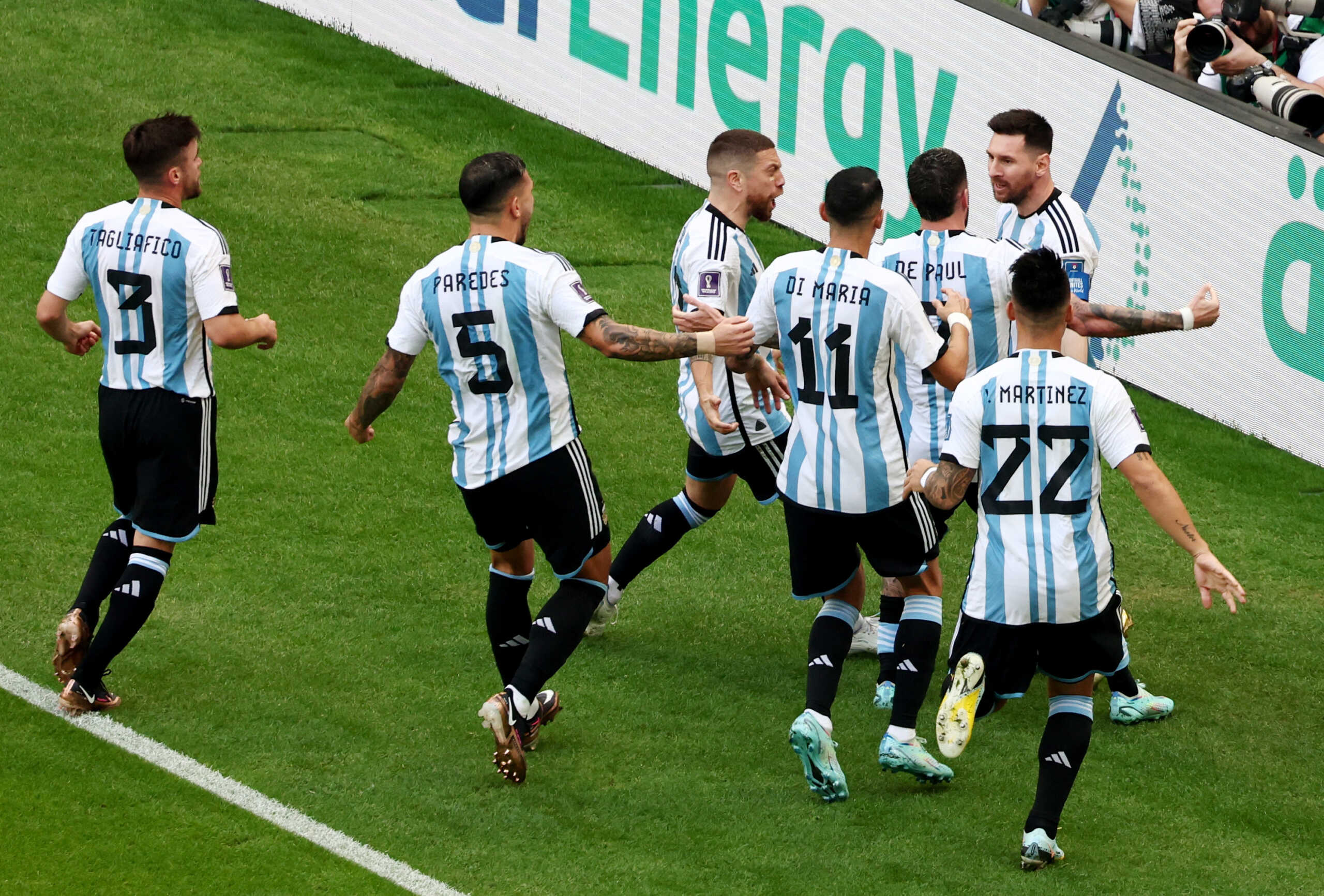 Soccer Football - FIFA World Cup Qatar 2022 - Group C - Argentina v Saudi Arabia - Lusail Stadium, Lusail, Qatar - November 22, 2022  Argentina's Lionel Messi celebrates scoring their first goal with teammates REUTERS