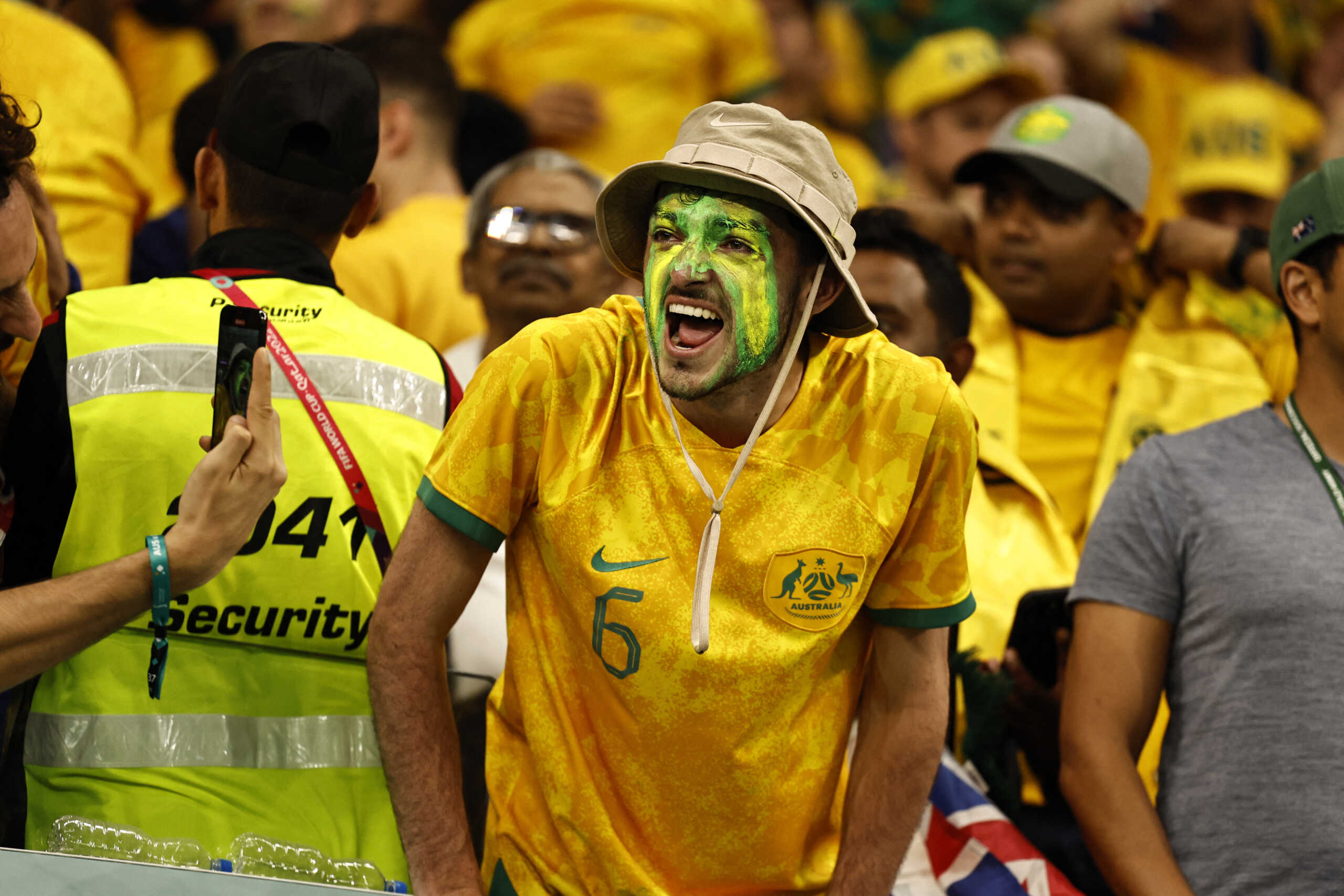 Soccer Football - FIFA World Cup Qatar 2022 - Group D - Australia v Denmark - Al Janoub Stadium, Al Wakrah, Qatar - November 30, 2022 Australia fans celebrate qualifying for the knockout stages REUTERS