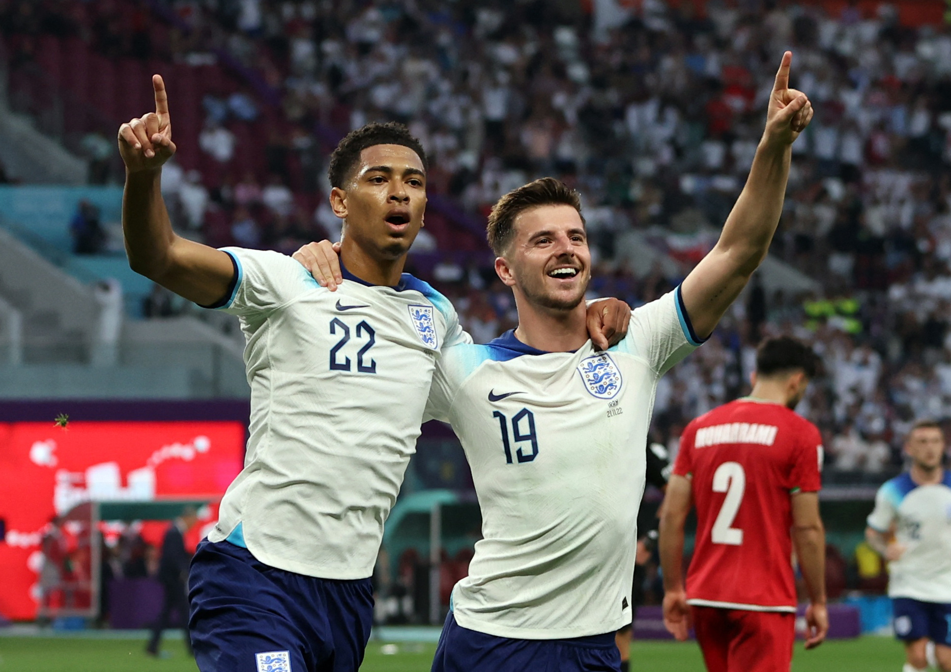 Soccer Football - FIFA World Cup Qatar 2022 - Group B - England v Iran - Khalifa International Stadium, Doha, Qatar - November 21, 2022 England's Jude Bellingham celebrates scoring their first goal with Mason Mount REUTERS