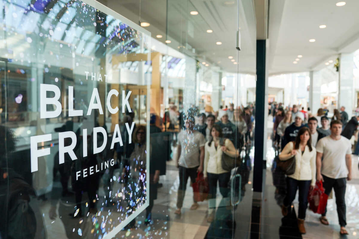FILE PHOTO: People walk through the King of Prussia mall, one of the largest retail malls in the U.S., on Black Friday, a day that kicks off the holiday shopping season, in King of Prussia, Pennsylvania, U.S., November 29, 2019. REUTERS
