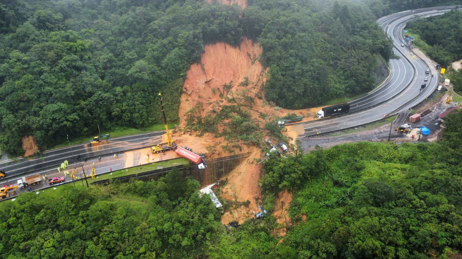 An aerial view shows a landslide in BR-376 federal road after heavy rains in Guaratuba, in Parana state, Brazil, November 29, 2022. Corpo de Bombeiros Militar de Santa Catarina