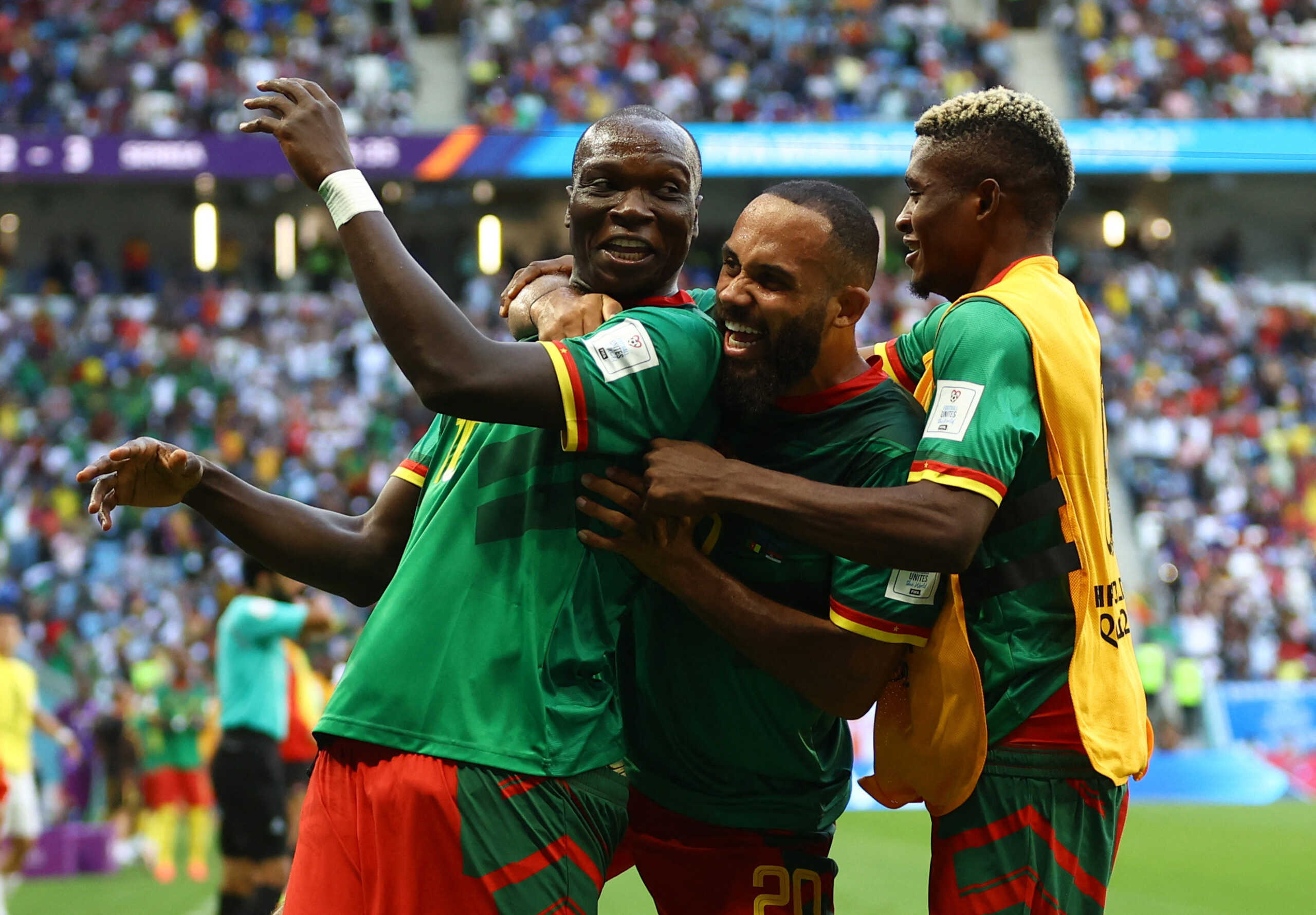 Soccer Football - FIFA World Cup Qatar 2022 - Group G - Cameroon v Serbia - Al Janoub Stadium, Al Wakrah, Qatar - November 28, 2022 Cameroon's Vincent Aboubakar and teammate celebrates their third goal, scored by Eric Maxim Choupo-Moting REUTERS