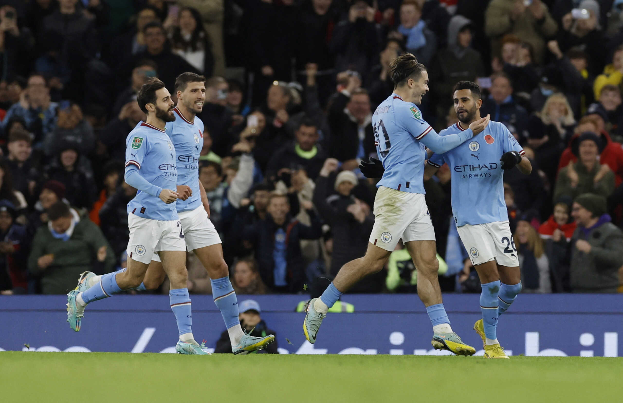 Soccer Football - Carabao Cup Third Round - Manchester City v Chelsea - Etihad Stadium, Manchester, Britain - November 9, 2022 Manchester City's Riyad Mahrez celebrates scoring their first goal with Bernardo Silva, Ruben Dias and Jack Grealish Action Images via Reuters
