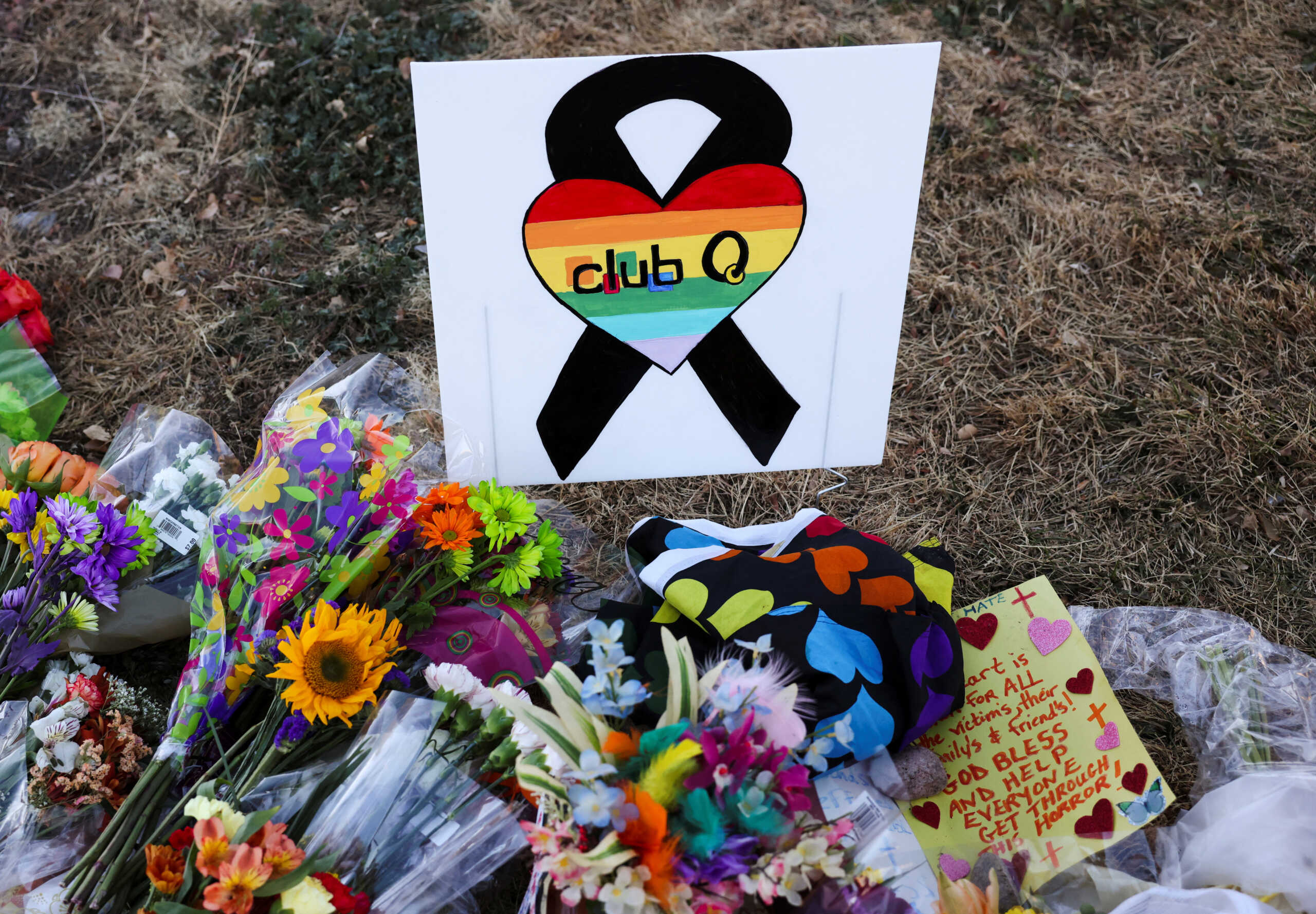 Floral tributes are placed in memory of the victims after a mass shooting at the Club Q gay nightclub in Colorado Springs, Colorado, U.S., November 20, 2022. REUTERS