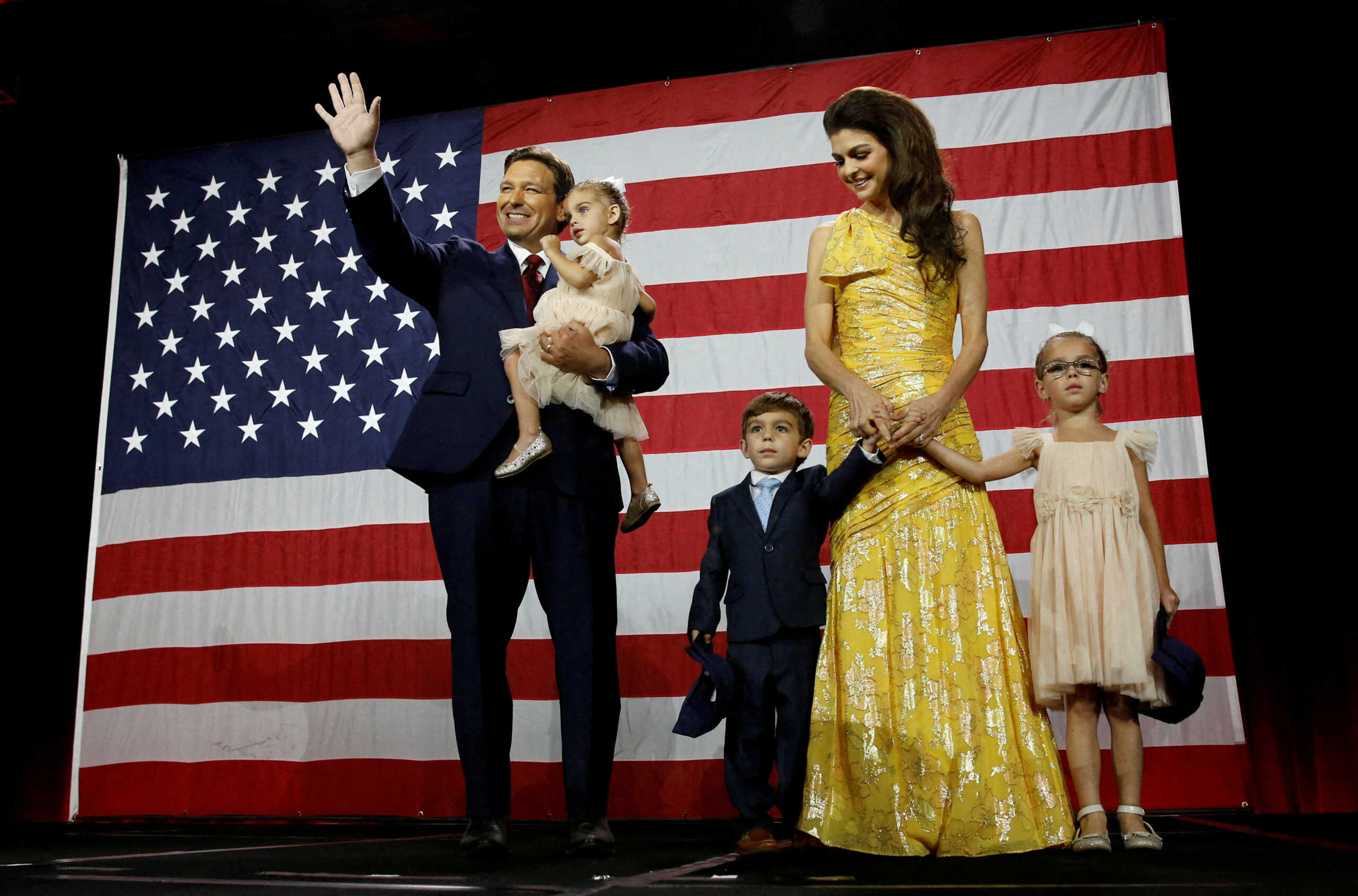 Republican Florida Governor Ron DeSantis waves from stage next to his wife Casey and children during his 2022 U.S. midterm elections night party in Tampa, Florida, U.S., November 8, 2022. REUTERS