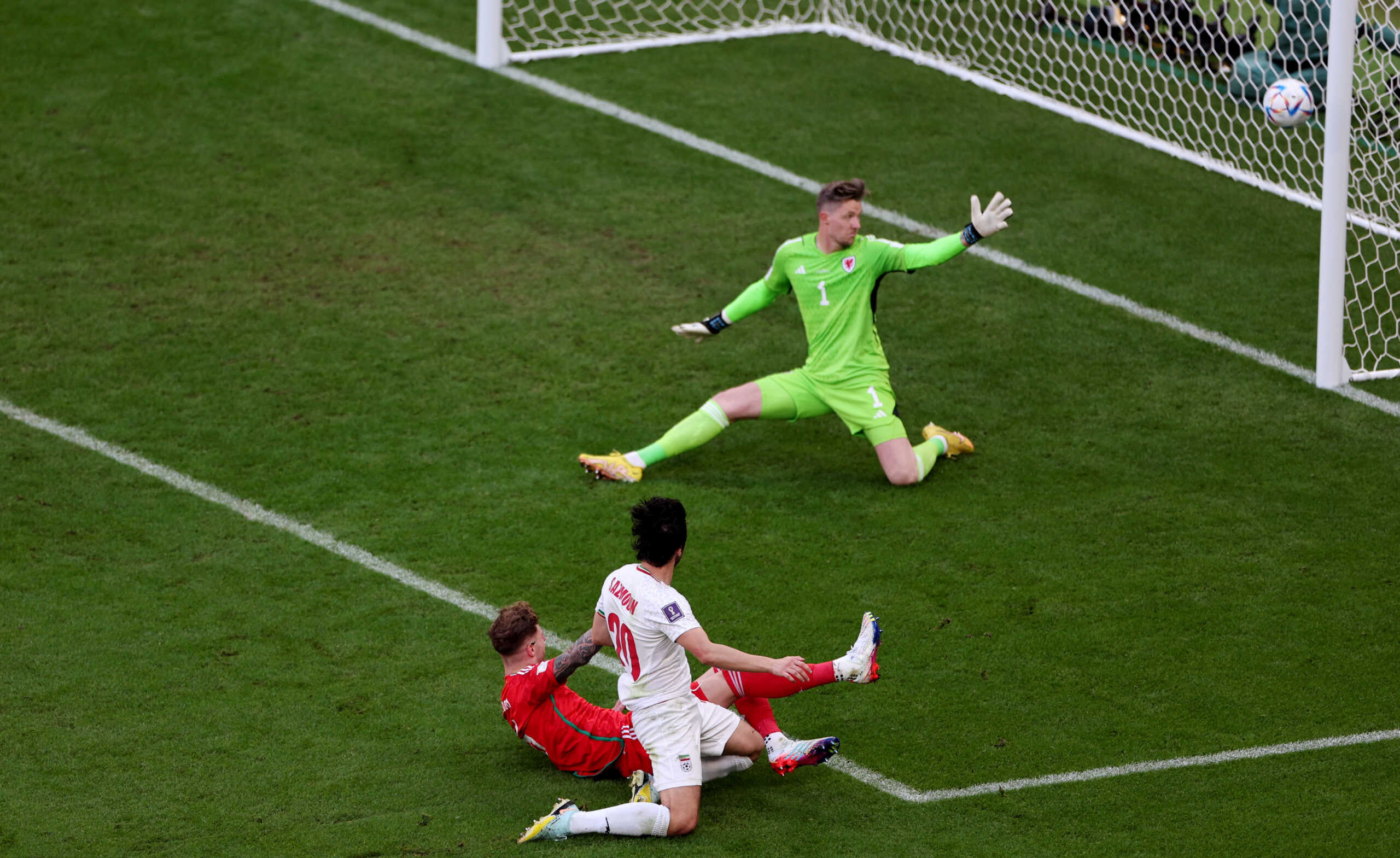 Soccer Football - FIFA World Cup Qatar 2022 - Group B - Wales v Iran - Ahmad Bin Ali Stadium, Al Rayyan, Qatar - November 25, 2022 Iran's Sardar Azmoun shoots against the post REUTERS