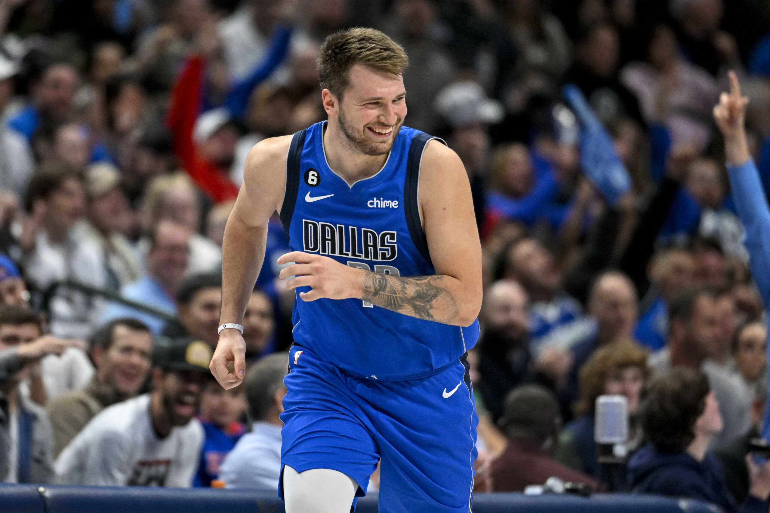 Nov 18, 2022; Dallas, Texas, USA; Dallas Mavericks guard Luka Doncic (77) celebrates making a three point shot against the Denver Nuggets during the second half at the American Airlines Center. Mandatory Credit: Jerome Miron-USA TODAY Sports