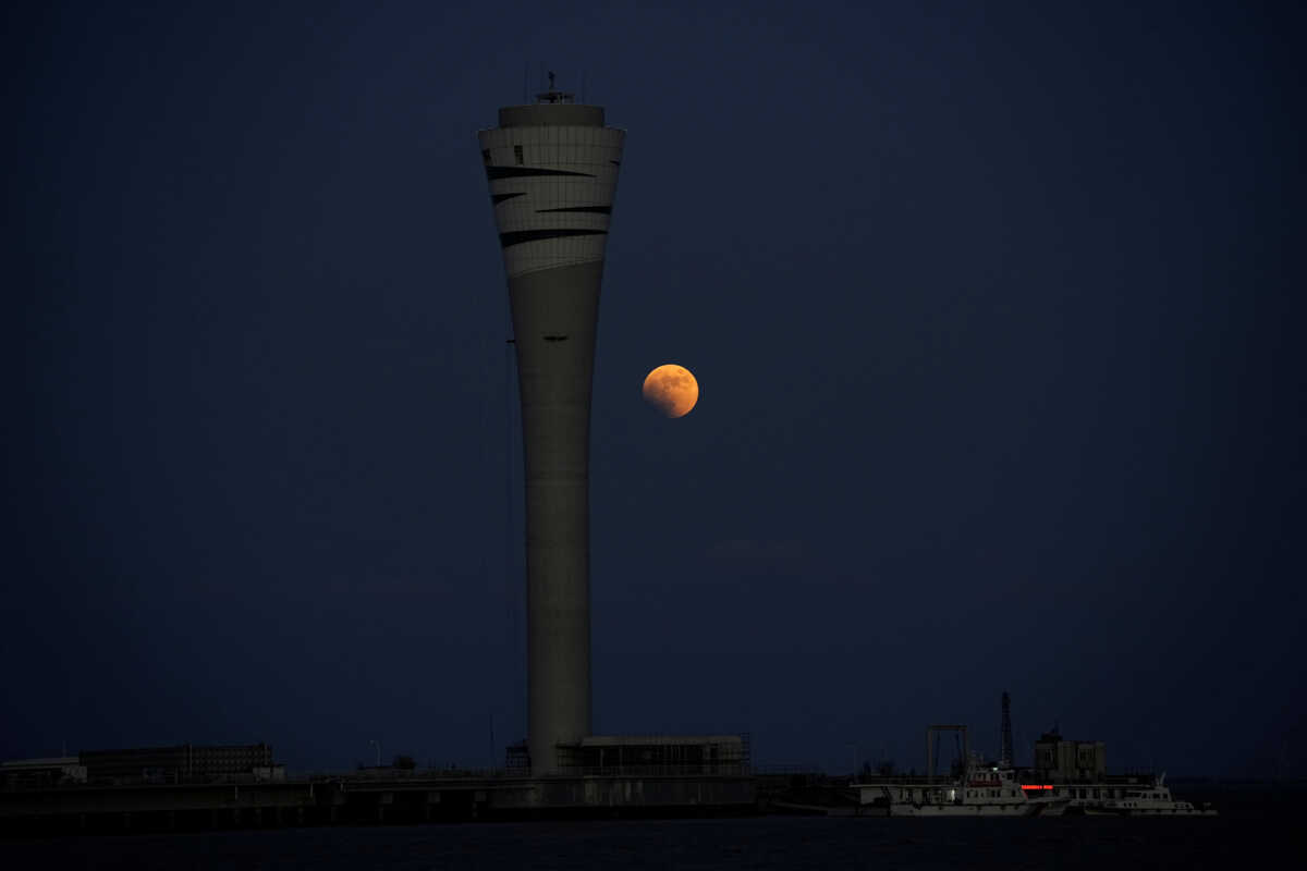 A moon is seen during a lunar eclipse, in Shanghai, China November 8, 2022. REUTERS