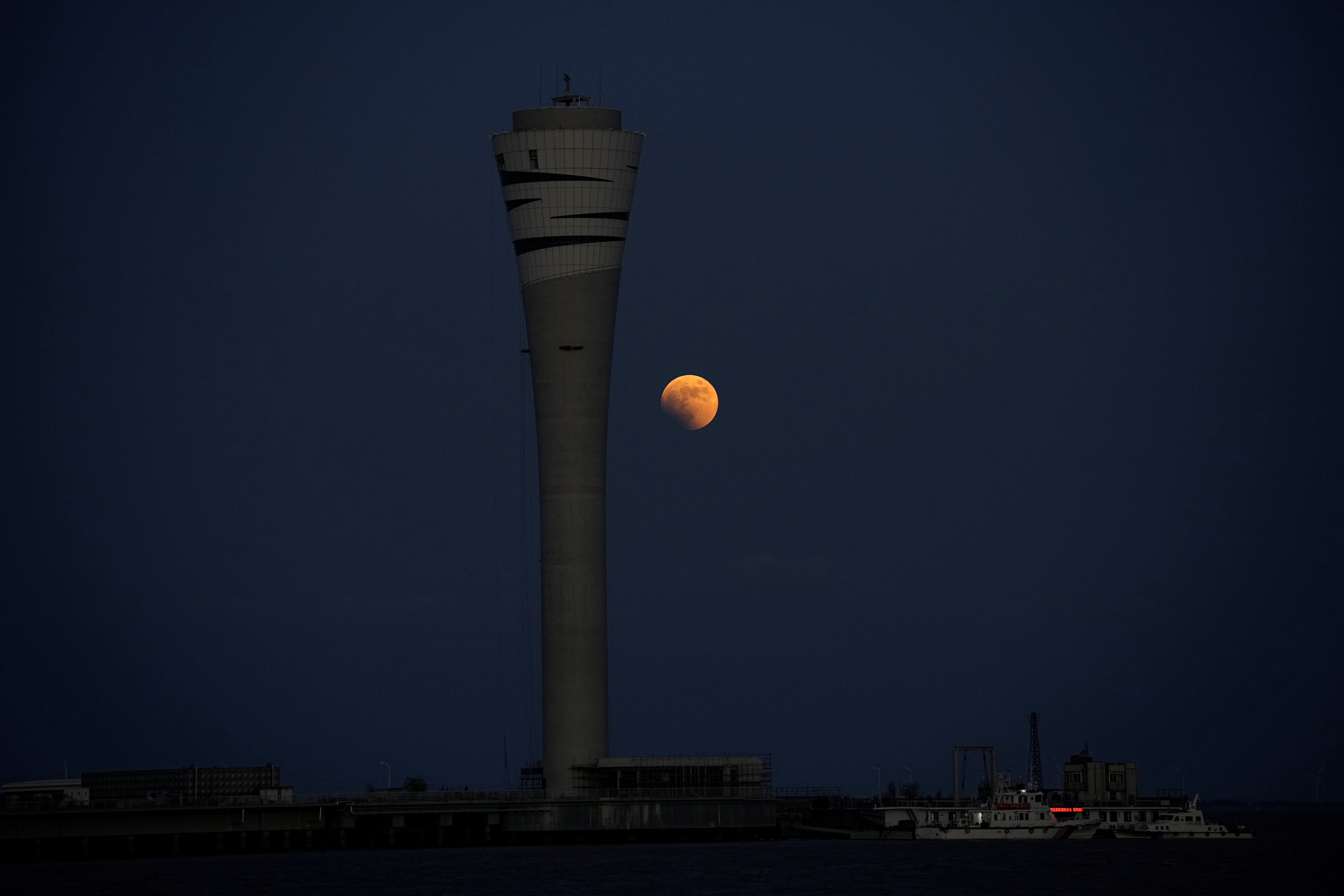 A moon is seen during a lunar eclipse, in Shanghai, China November 8, 2022. REUTERS