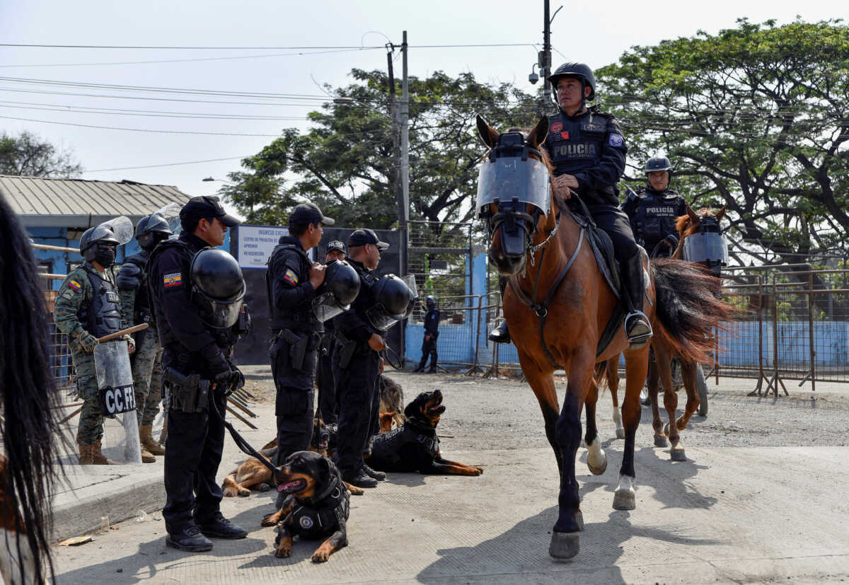 Mounted riot police leave the jail during ongoing prisoner transfers done as part of a government plan to reduce overcrowding in the country's prisons, in Guayaquil, Ecuador November 1, 2022. REUTERS