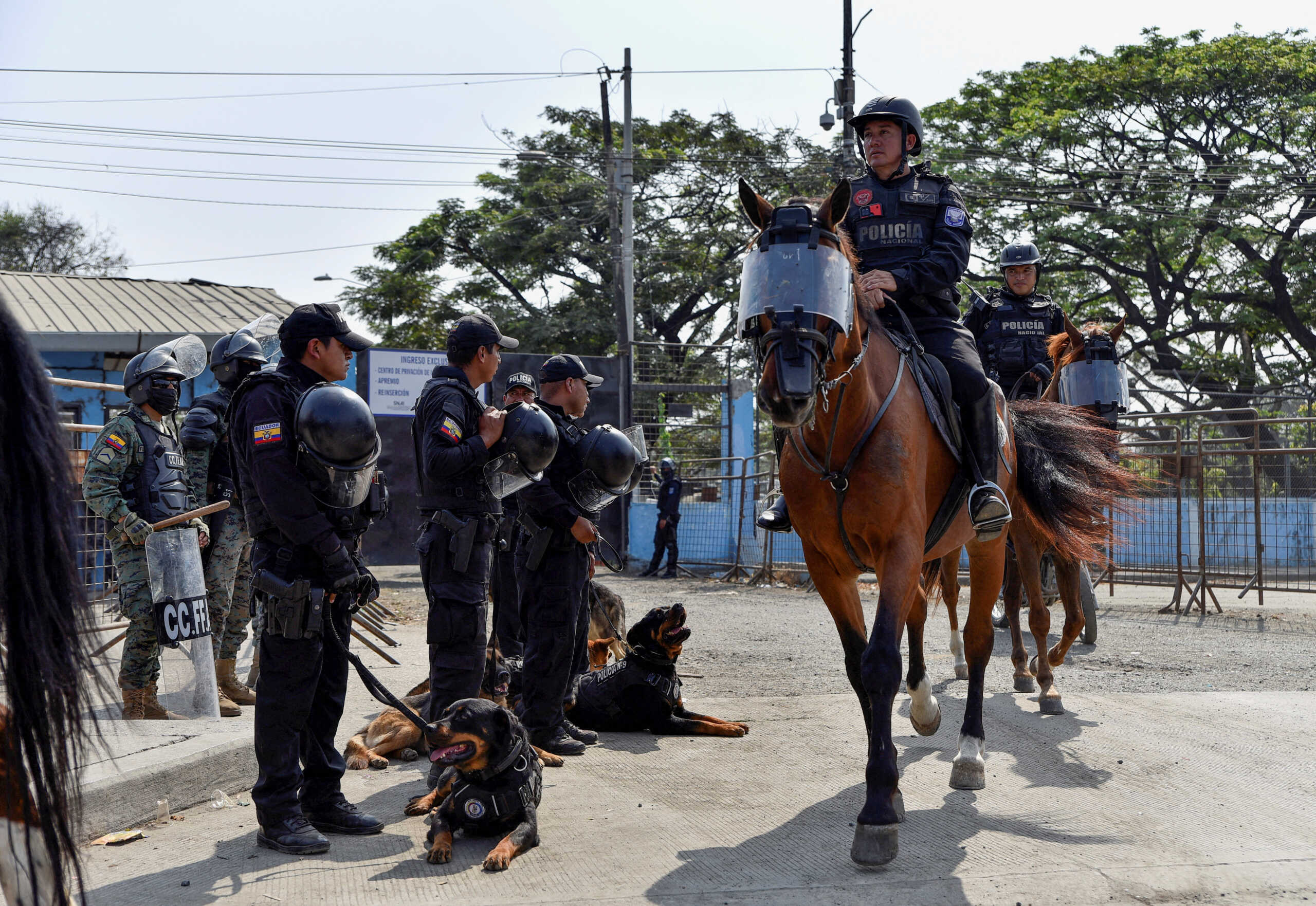 Mounted riot police leave the jail during ongoing prisoner transfers done as part of a government plan to reduce overcrowding in the country's prisons, in Guayaquil, Ecuador November 1, 2022. REUTERS
