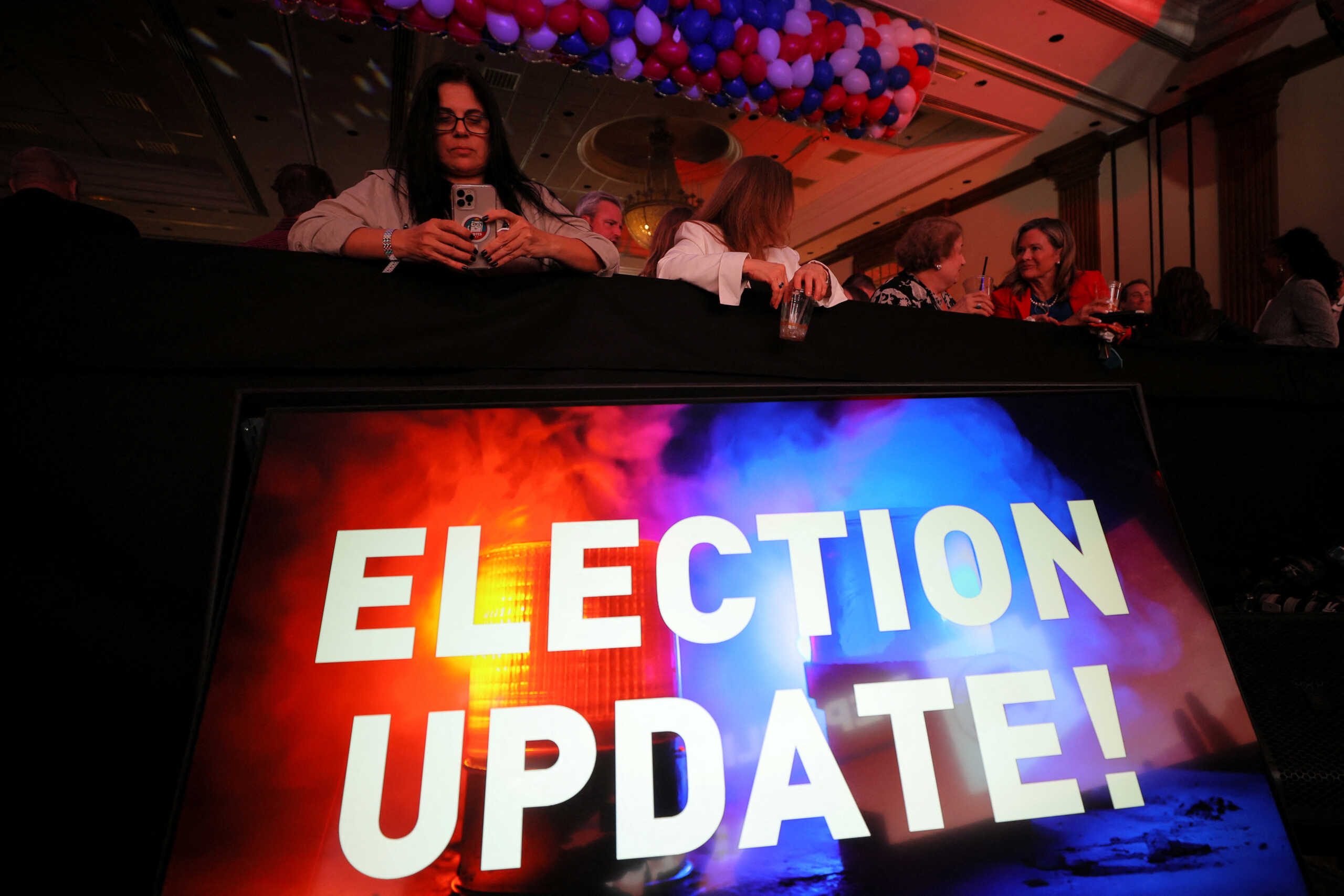 Supporters wait for results at the Republican Party of Arizona's 2022 U.S. midterm elections night rally in Scottsdale, Arizona, U.S., November 8, 2022. REUTERS