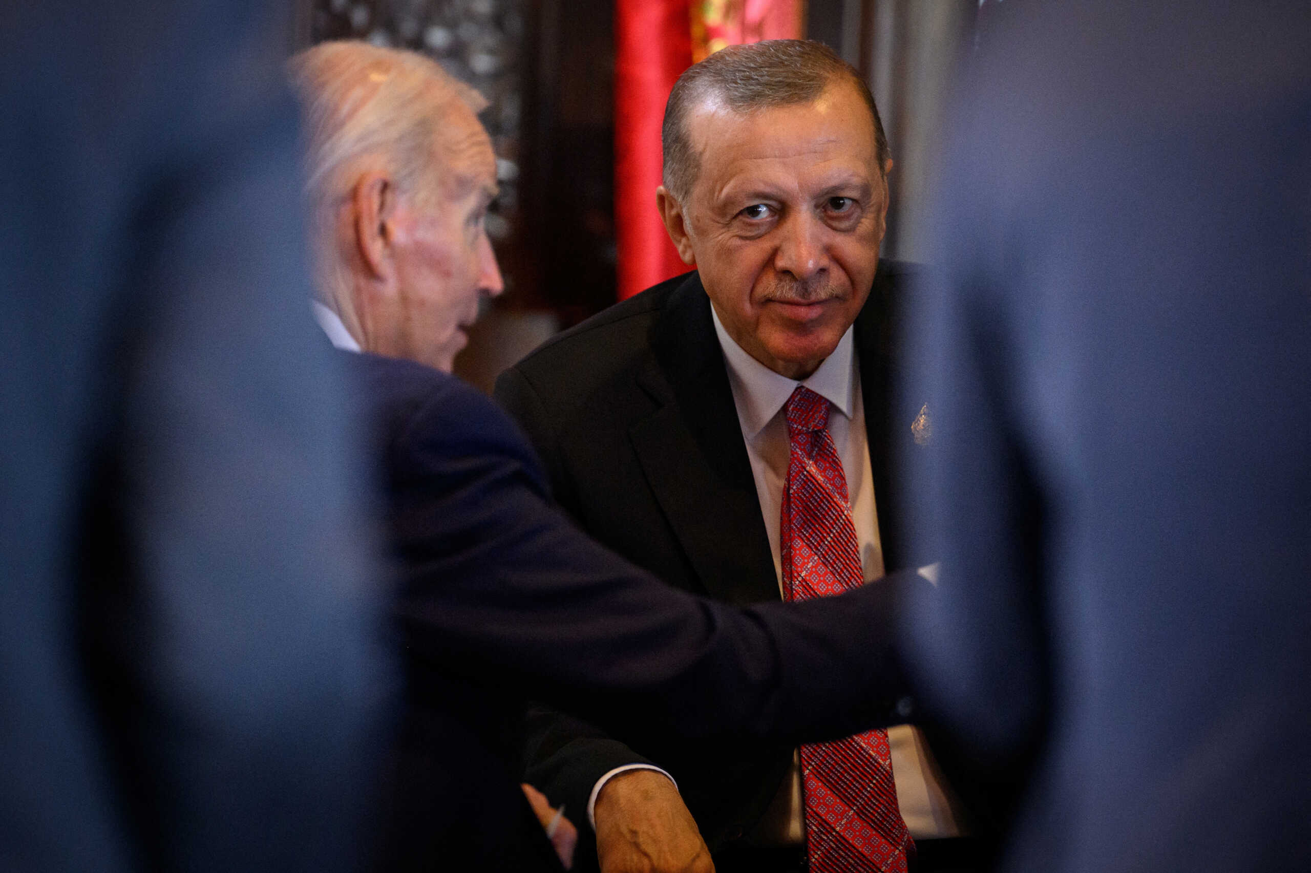NUSA DUA, INDONESIA - NOVEMBER 15: President Joe Biden of the United States of America (L) and President Recep Tayyip Erdogan of Turkey talk during the G20 Summit on November 15, 2022 in Nusa Dua, Indonesia. The G20 meetings are being held in Bali from November 15-16.     Leon Neal