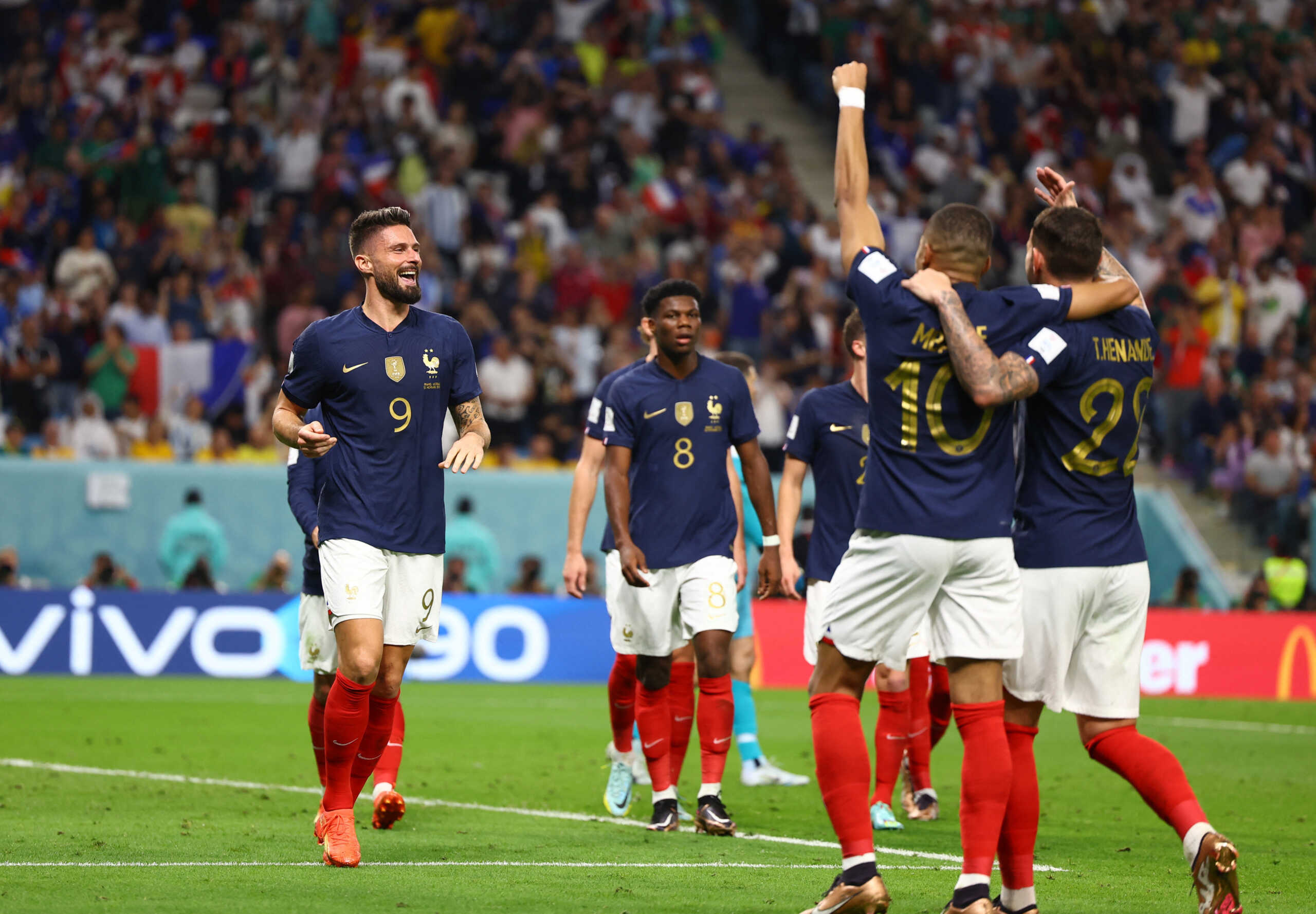 Soccer Football - FIFA World Cup Qatar 2022 - Group D - France v Australia - Al Janoub Stadium, Al Wakrah, Qatar - November 22, 2022  France's Olivier Giroud celebrates scoring their fourth goal with Kylian Mbappe and Theo Hernandez REUTERS