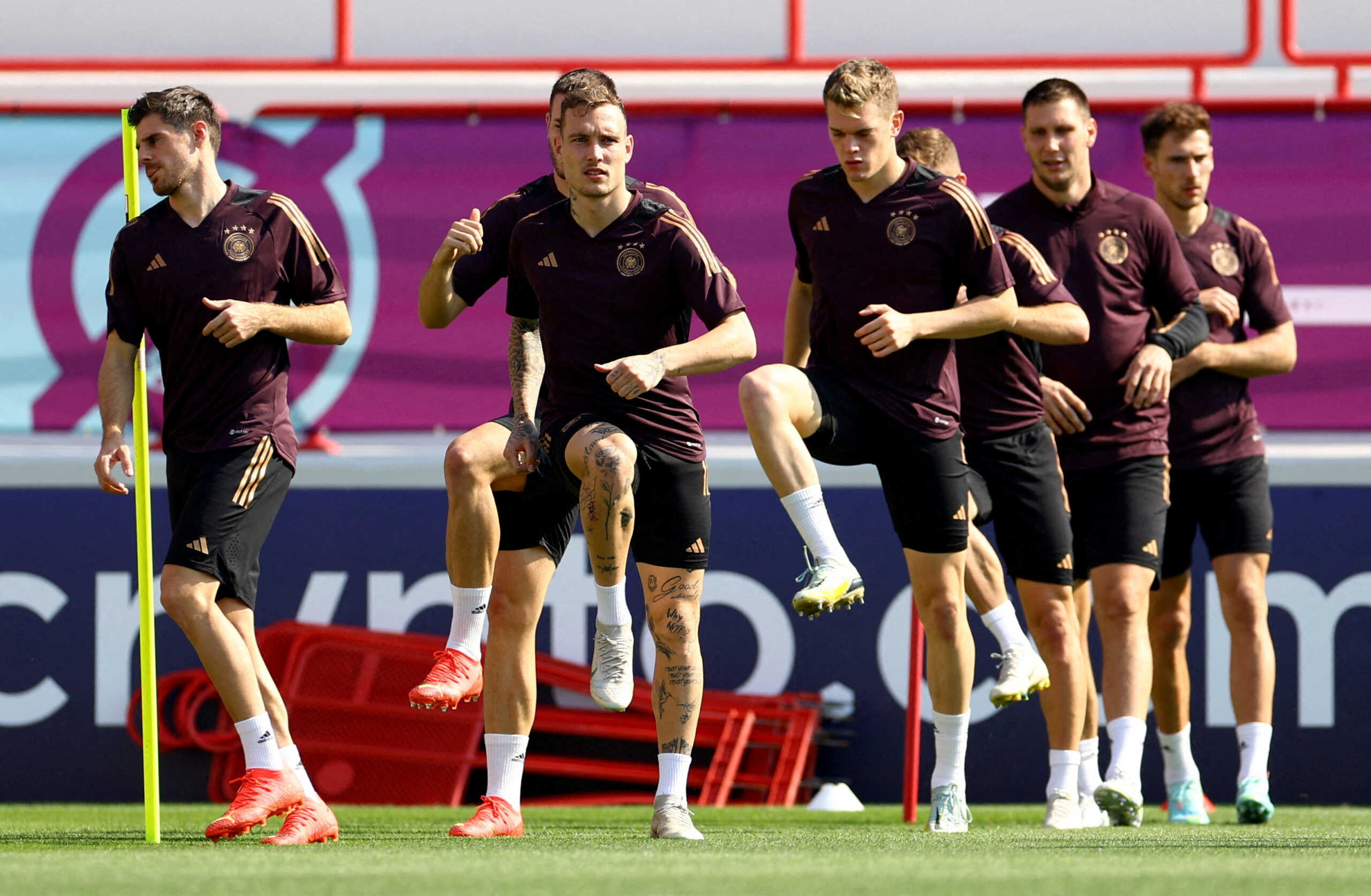 FILE PHOTO: Soccer Football - FIFA World Cup Qatar 2022 - Germany Training - Al Shamal Stadium, Al Shamal, Qatar - November 22, 2022 Germany's David Raum with teammates during training REUTERS