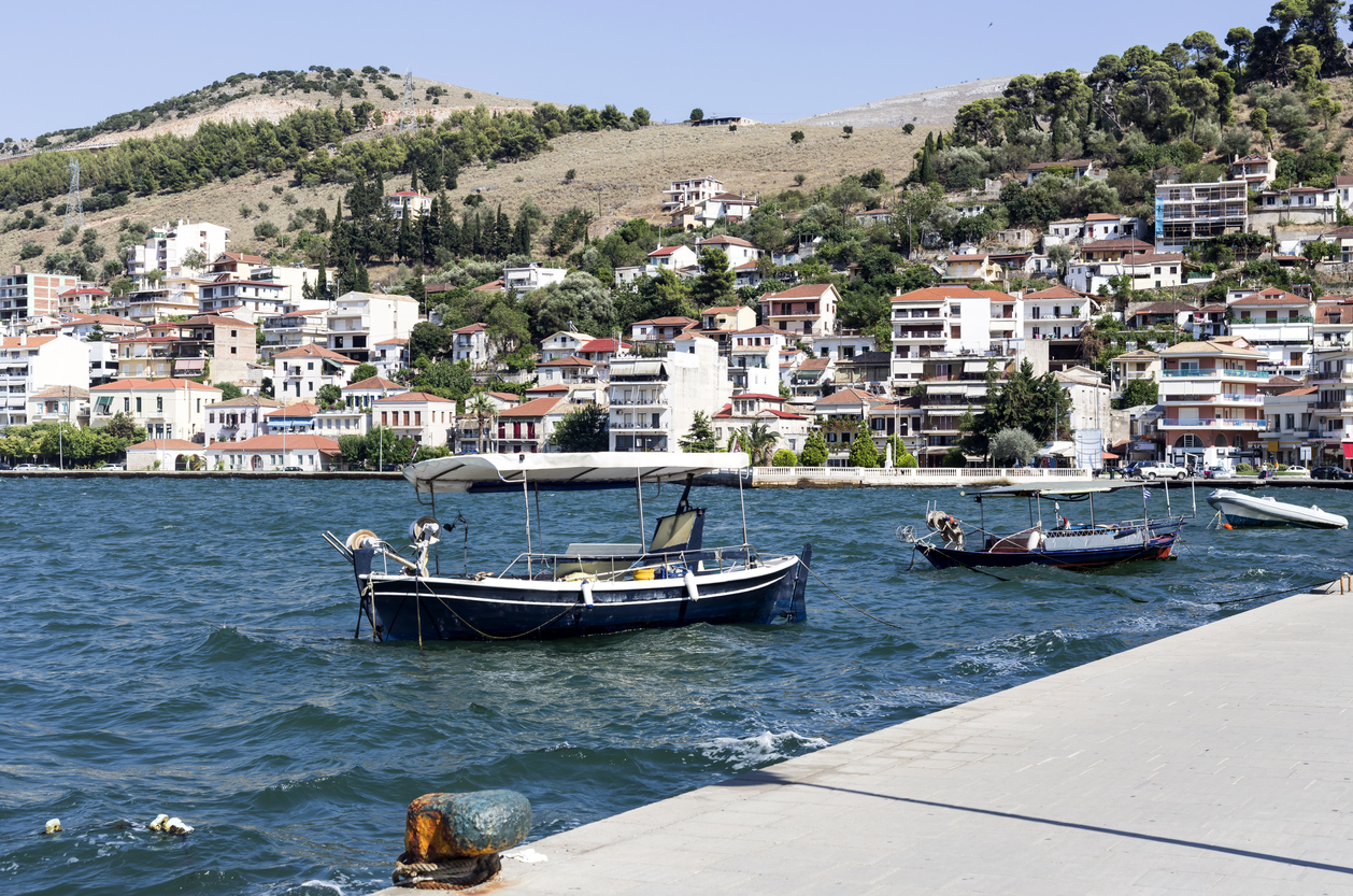 View on moored fishing boat (town Amfilochia, Mediterranean, Greece) on a summer sunny day