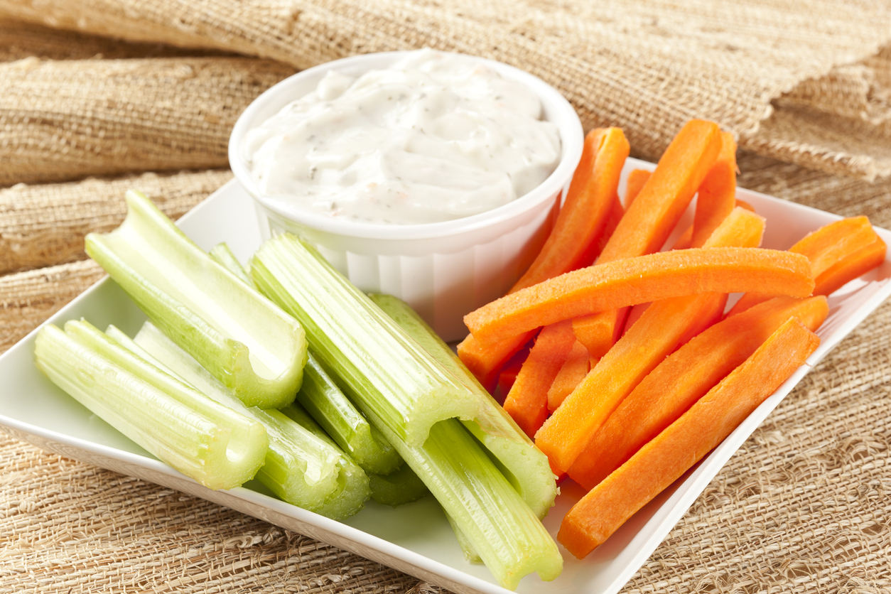 Ranch dressing with fresh carrots and celery