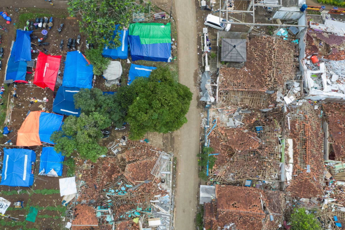 An aerial view of makeshift tents built near badly damaged houses after Monday's earthquake in Cianjur, West Java province, Indonesia, November 25, 2022, in this photo taken by Antara Foto. Antara Foto