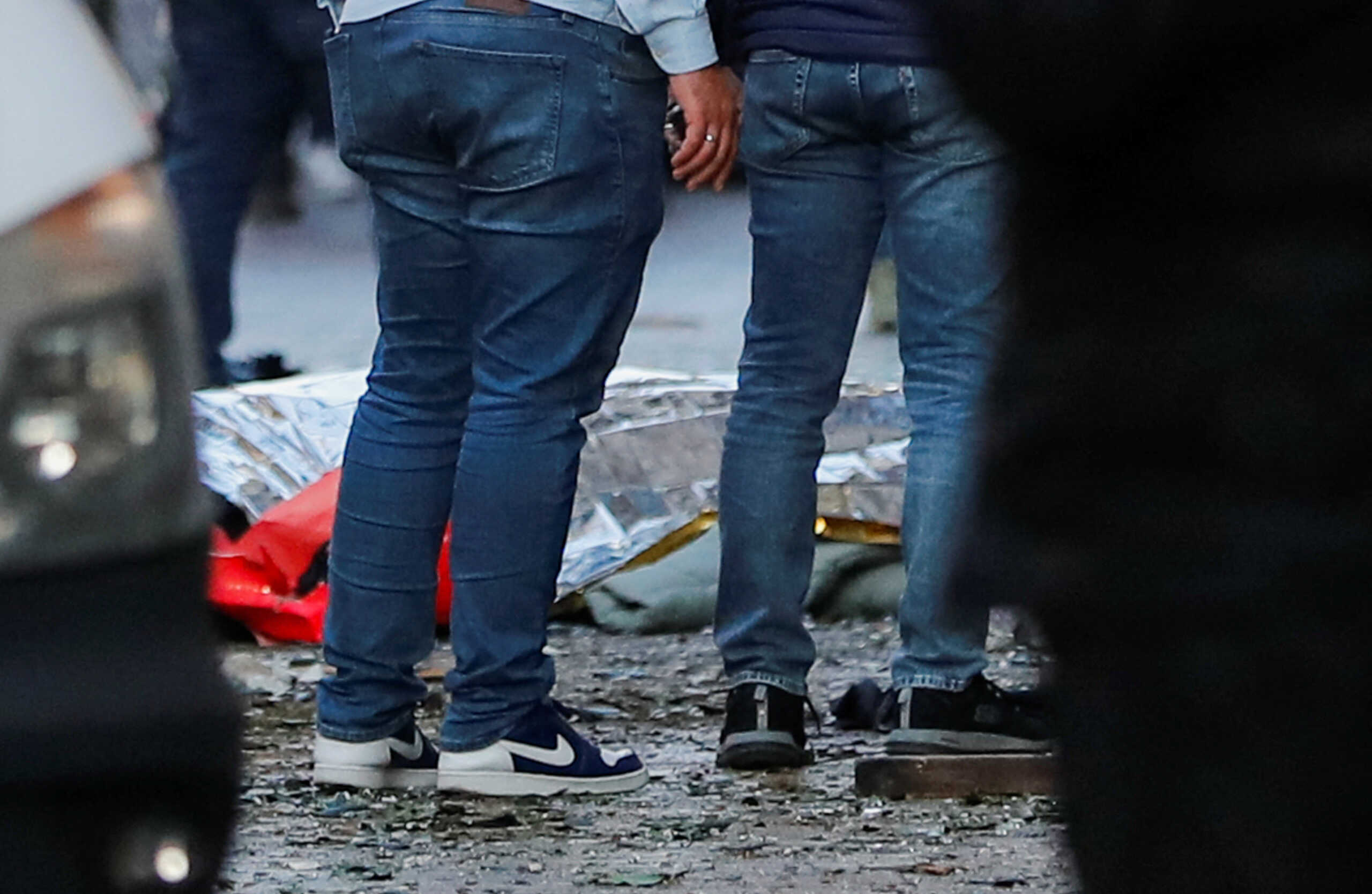 Bodies of unidentified people lay on the ground after an explosion on busy pedestrian Istiklal street in Istanbul, Turkey, November 13, 2022. REUTERS