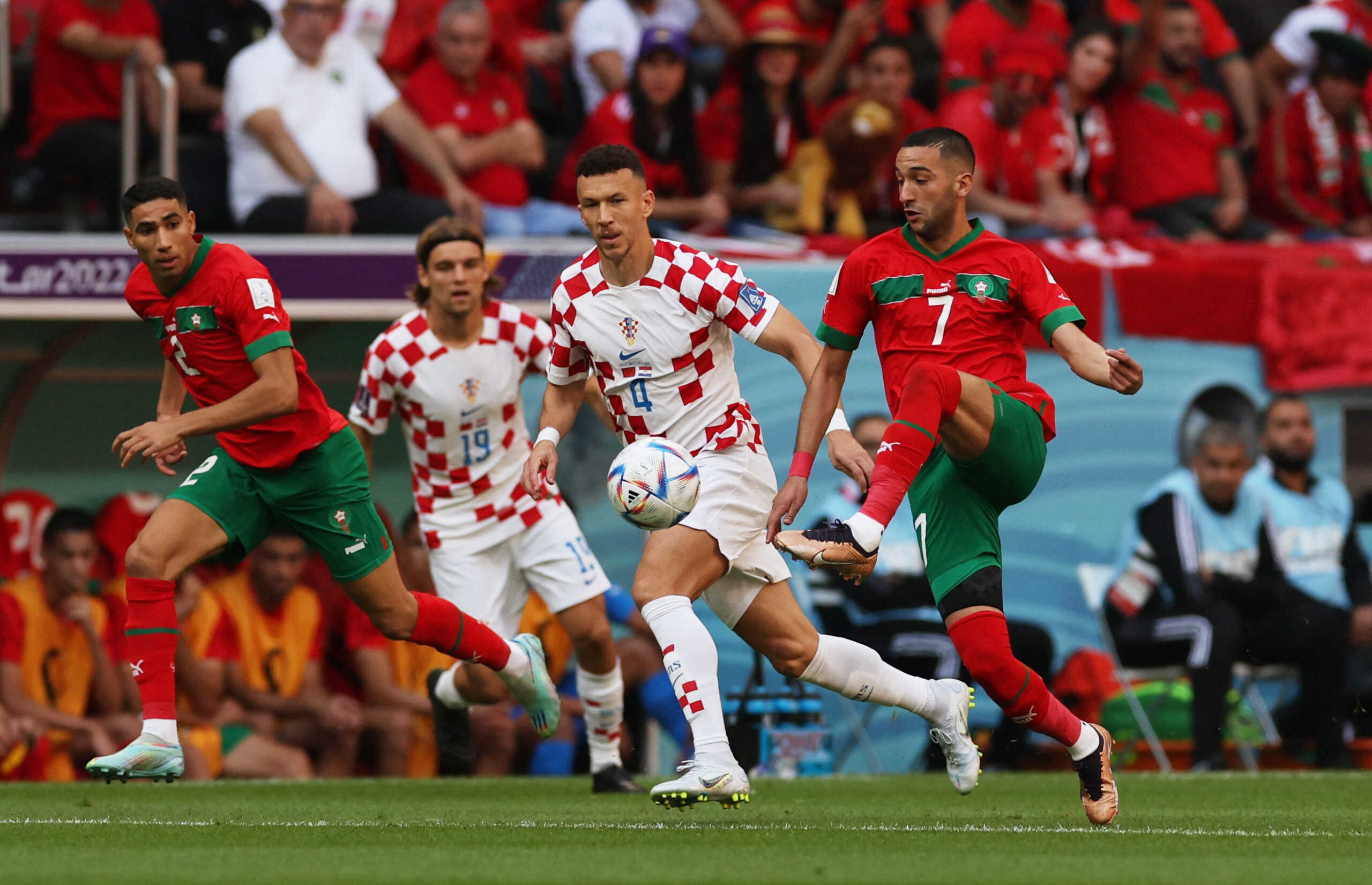 Soccer Football - FIFA World Cup Qatar 2022 - Group F - Morocco v Croatia - Al Bayt Stadium, Al Khor, Qatar - November 23, 2022 Morocco's Hakim Ziyech in action with Croatia's Ivan Perisic REUTERS