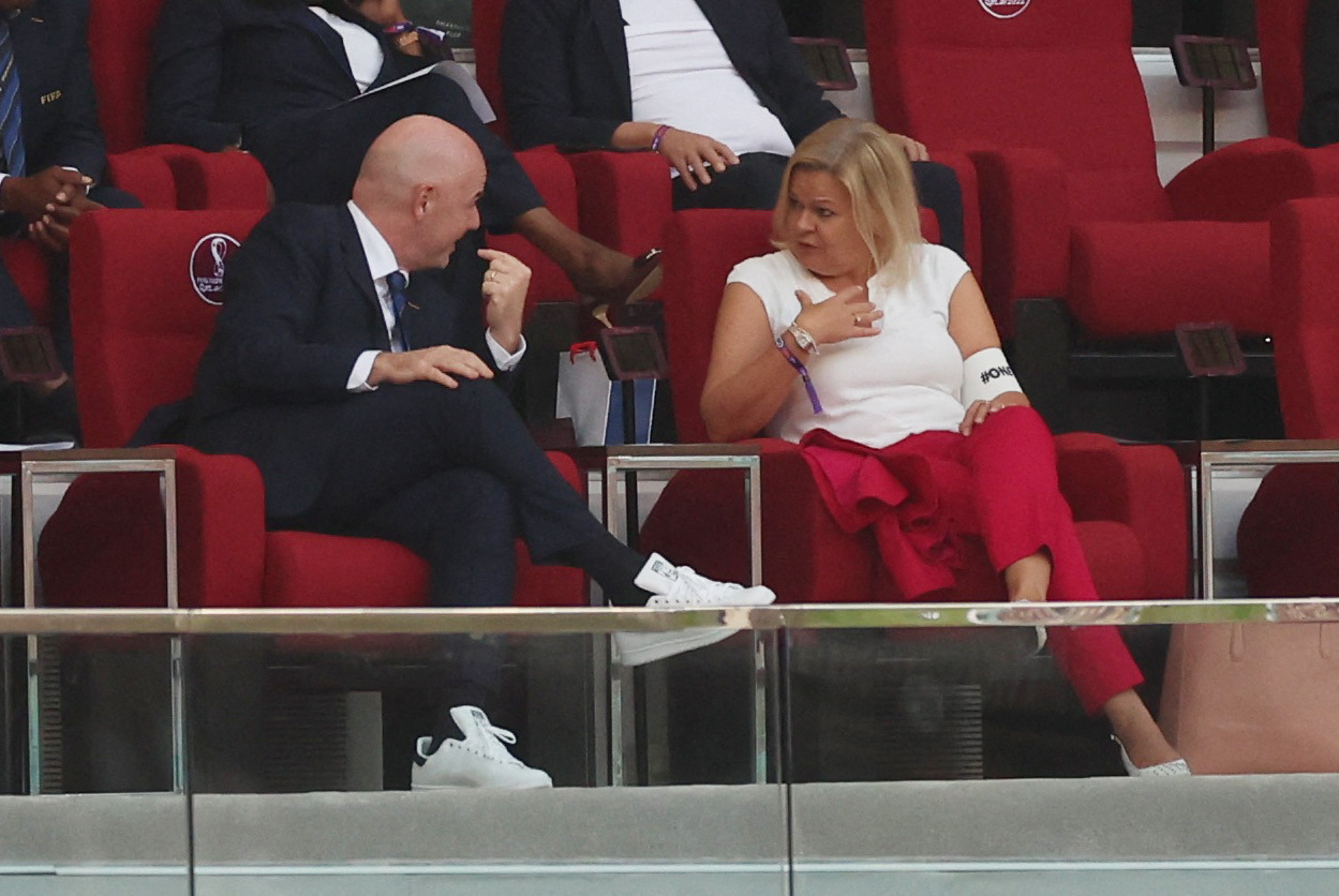 Soccer Football - FIFA World Cup Qatar 2022 - Group E - Germany v Japan - Khalifa International Stadium, Doha, Qatar - November 23, 2022 German Interior Minister Nancy Faeser is seen wearing the OneLove armband alongside FIFA president Gianni Infantino REUTERS