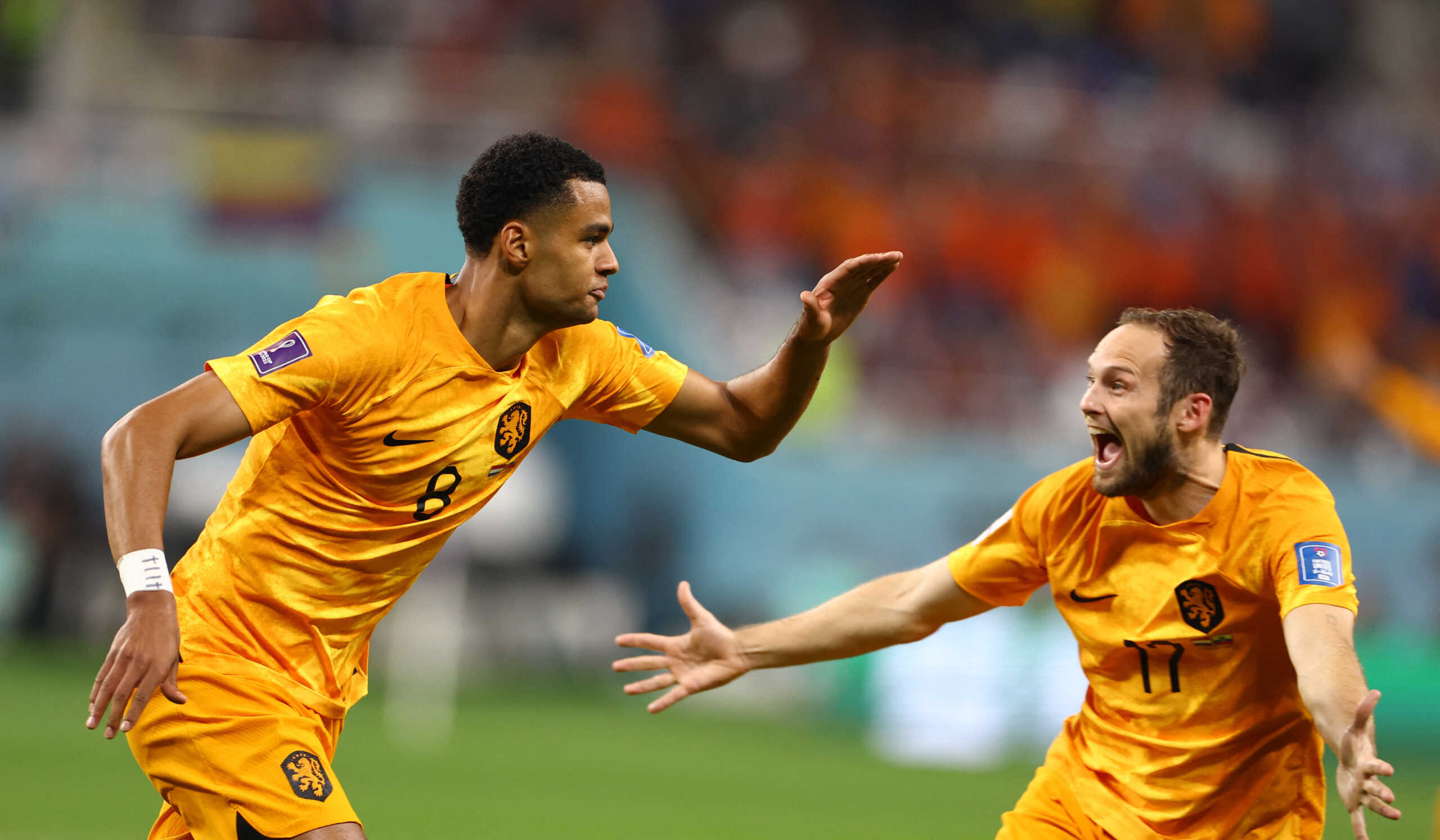 Soccer Football - FIFA World Cup Qatar 2022 - Group A - Netherlands v Ecuador - Khalifa International Stadium, Doha, Qatar - November 25, 2022 Netherlands' Cody Gakpo celebrates scoring their first goal with Daley Blind REUTERS