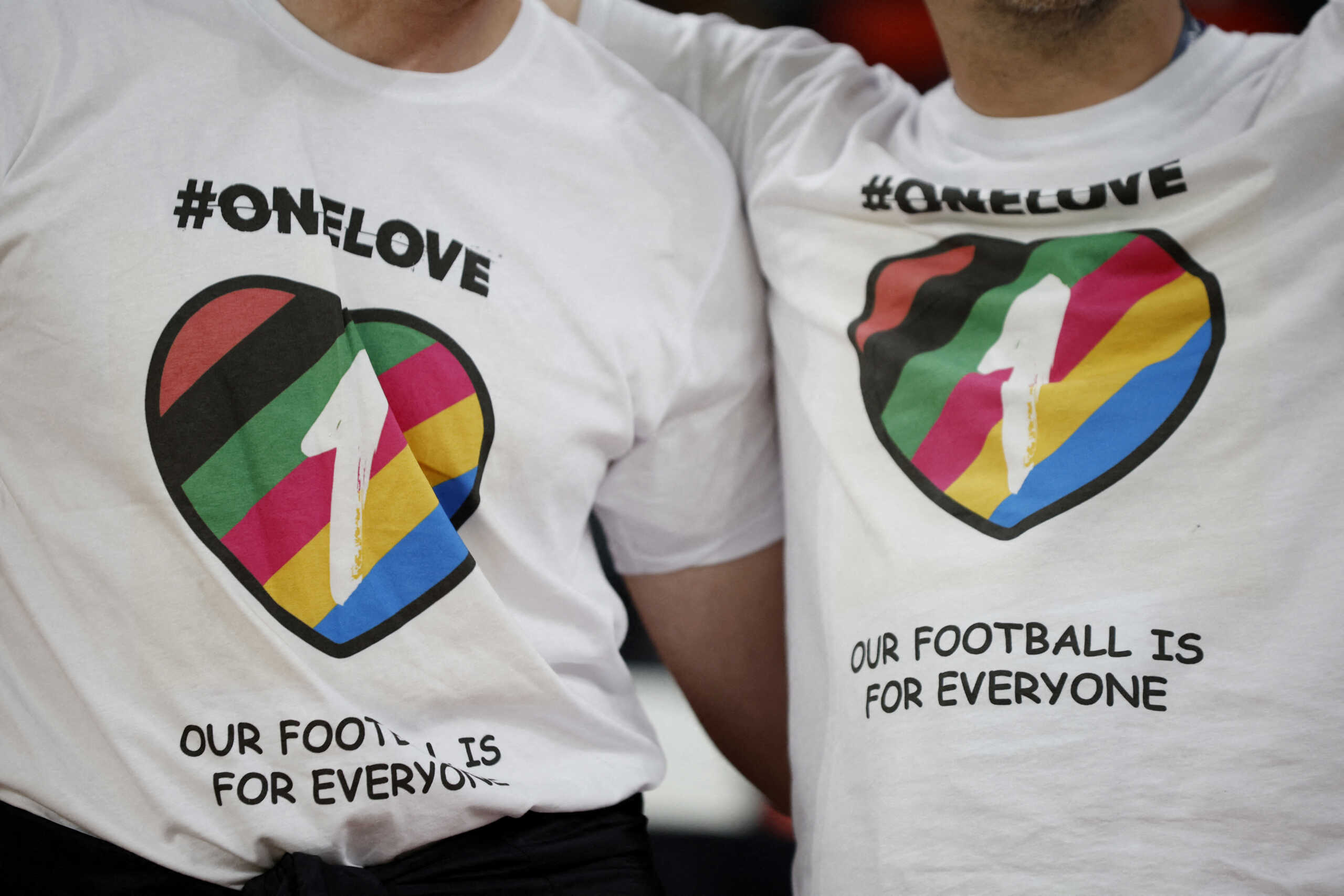 Soccer Football - FIFA World Cup Qatar 2022 - Group F - Belgium v Canada - Ahmad Bin Ali Stadium, Al Rayyan, Qatar - November 23, 2022 Belgium fans wear a OneLove t-shirts inside the stadium before the match REUTERS