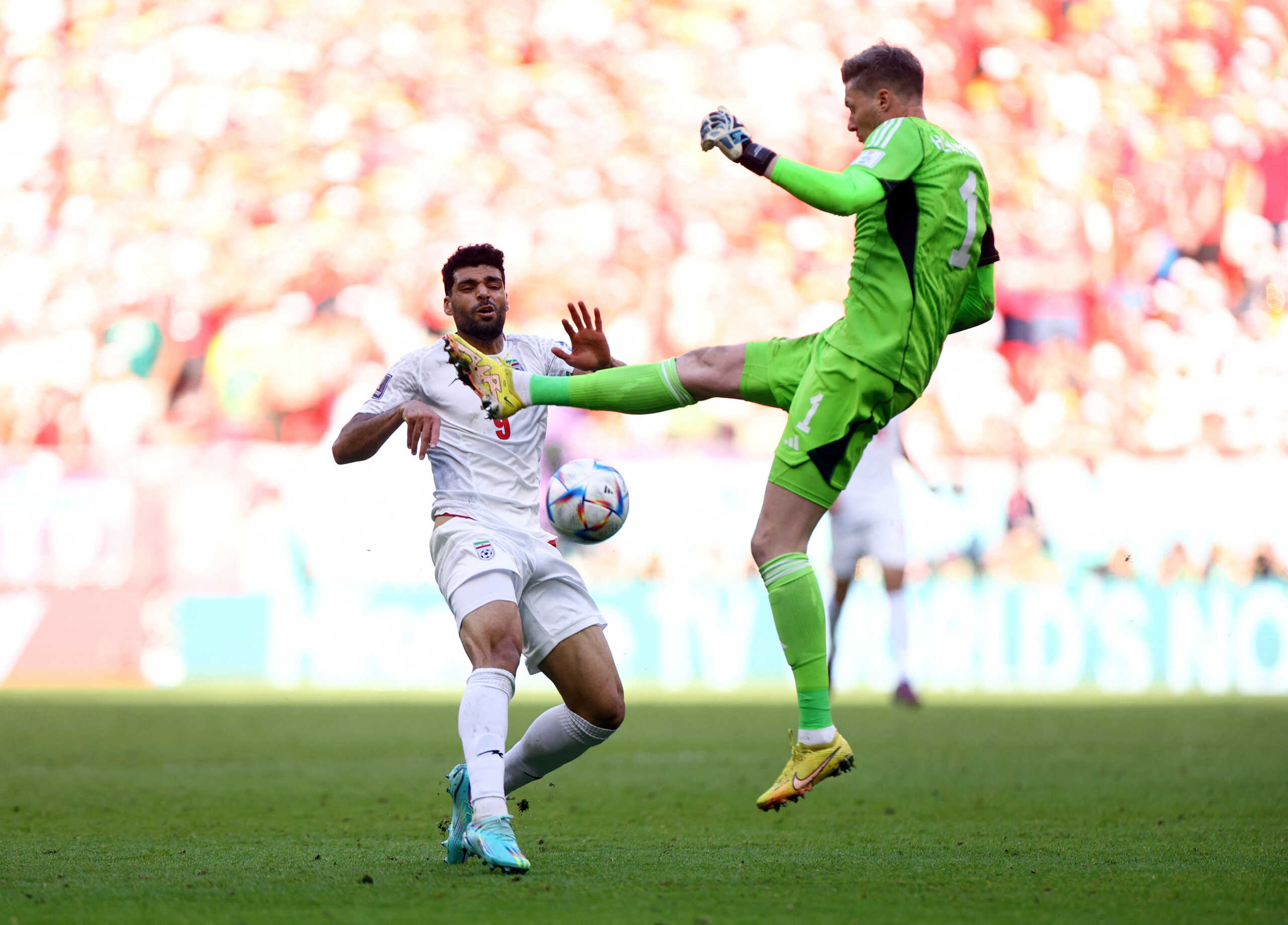 Soccer Football - FIFA World Cup Qatar 2022 - Group B - Wales v Iran - Ahmad Bin Ali Stadium, Al Rayyan, Qatar - November 25, 2022 Wales' Wayne Hennessey fouls Iran's Mehdi Taremi and subsequently receives a red card and is sent off REUTERS