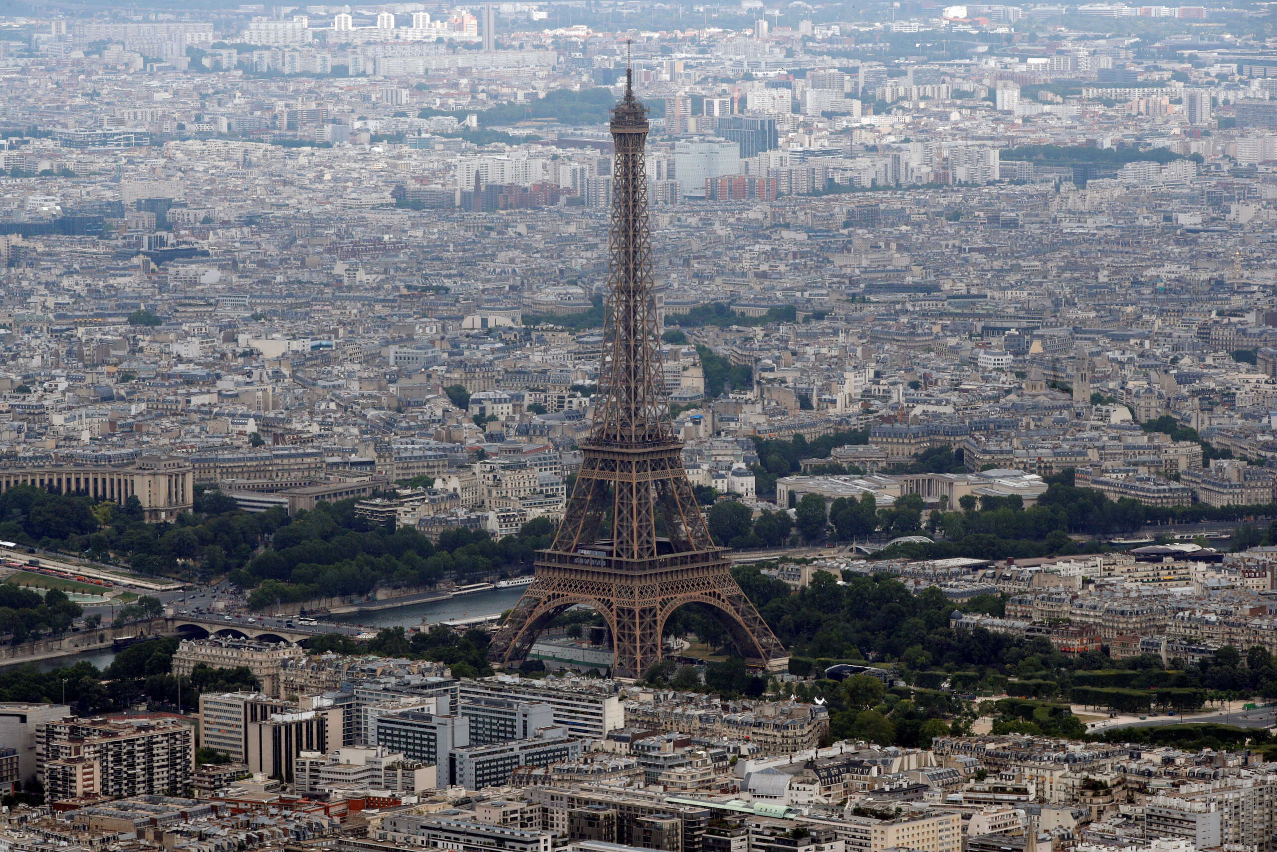 FILE PHOTO: An aerial view shows the Eiffel tower, the Seine River and the Paris skyline, France, July 14, 2019. REUTERS